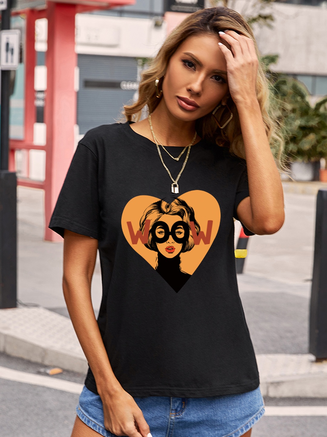 

URBANIC Women Black & Orange Graphic Print T-shirt