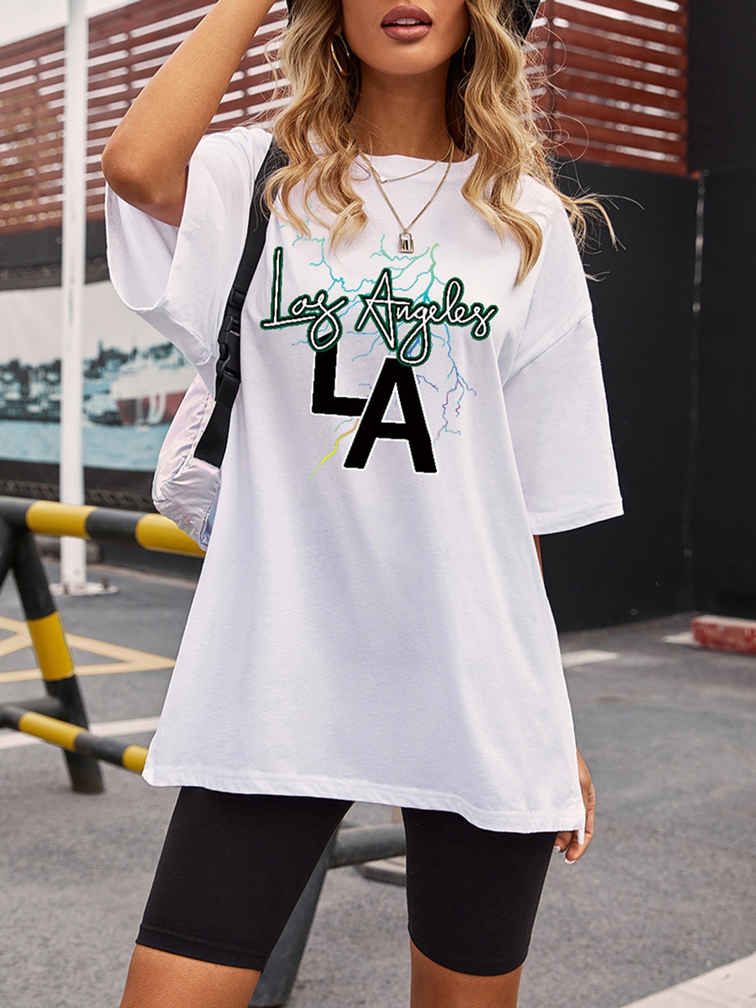 

URBANIC Women White & Black Cotton Typography Print Drop-Shoulder Sleeves Loose T-shirt