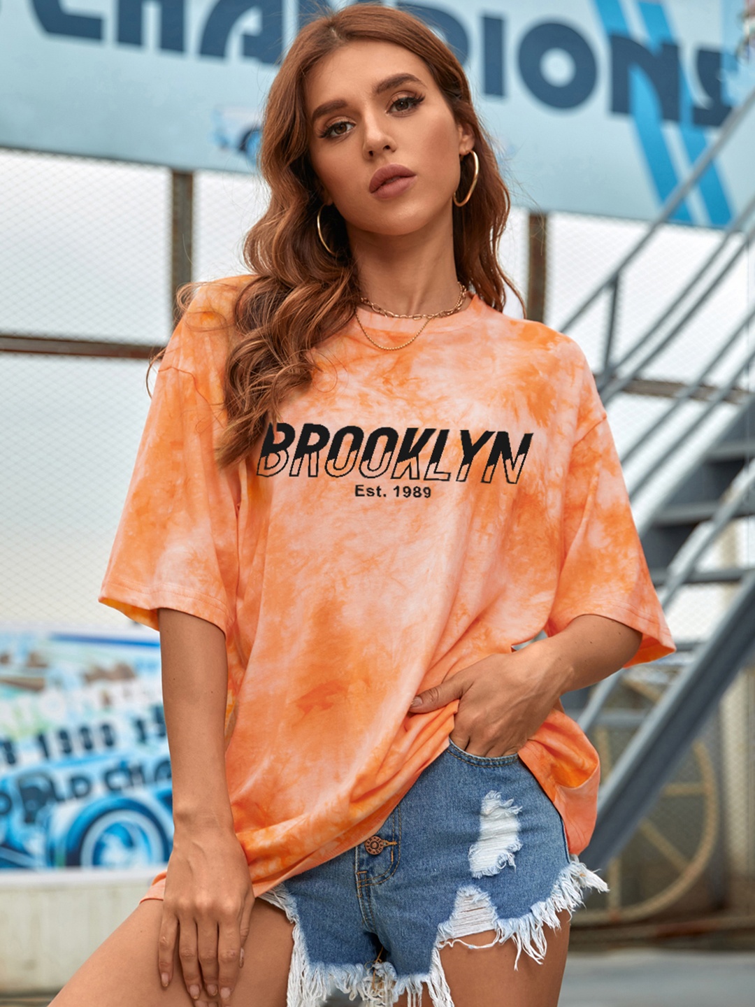 

URBANIC Women Orange & Black Tie and Dye Dyed Extended Sleeves T-shirt