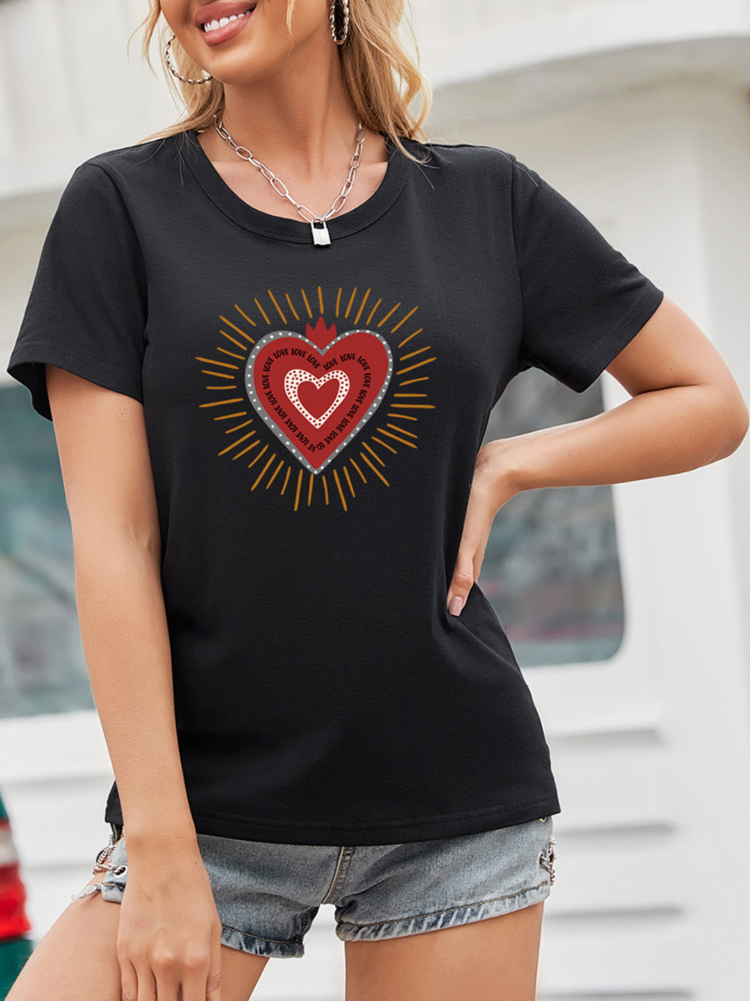 

URBANIC Women Black & Red Graphic Printed T-shirt