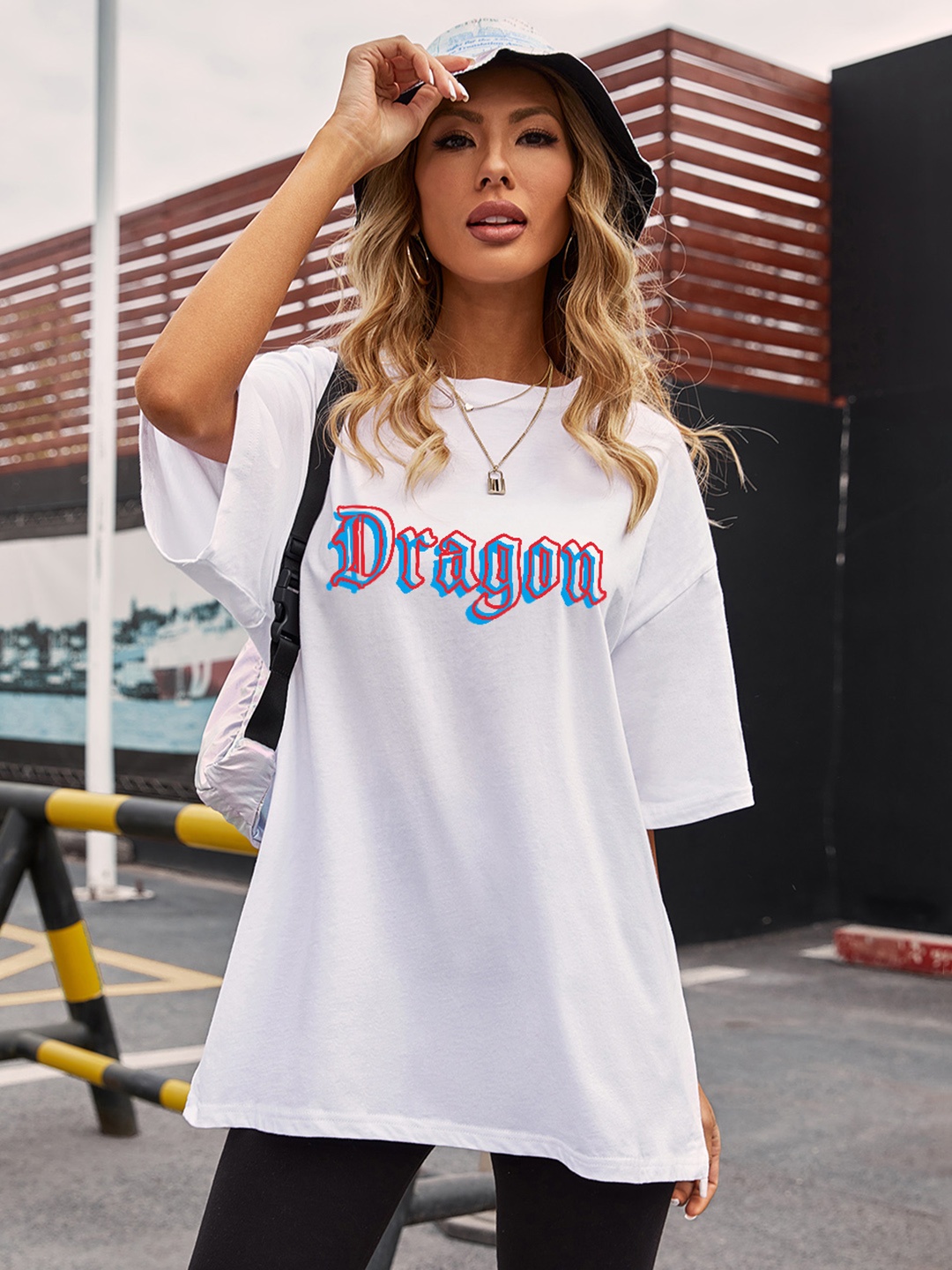 

URBANIC Women White Cotton Extra Relaxed Fit Typography Printed T-shirt