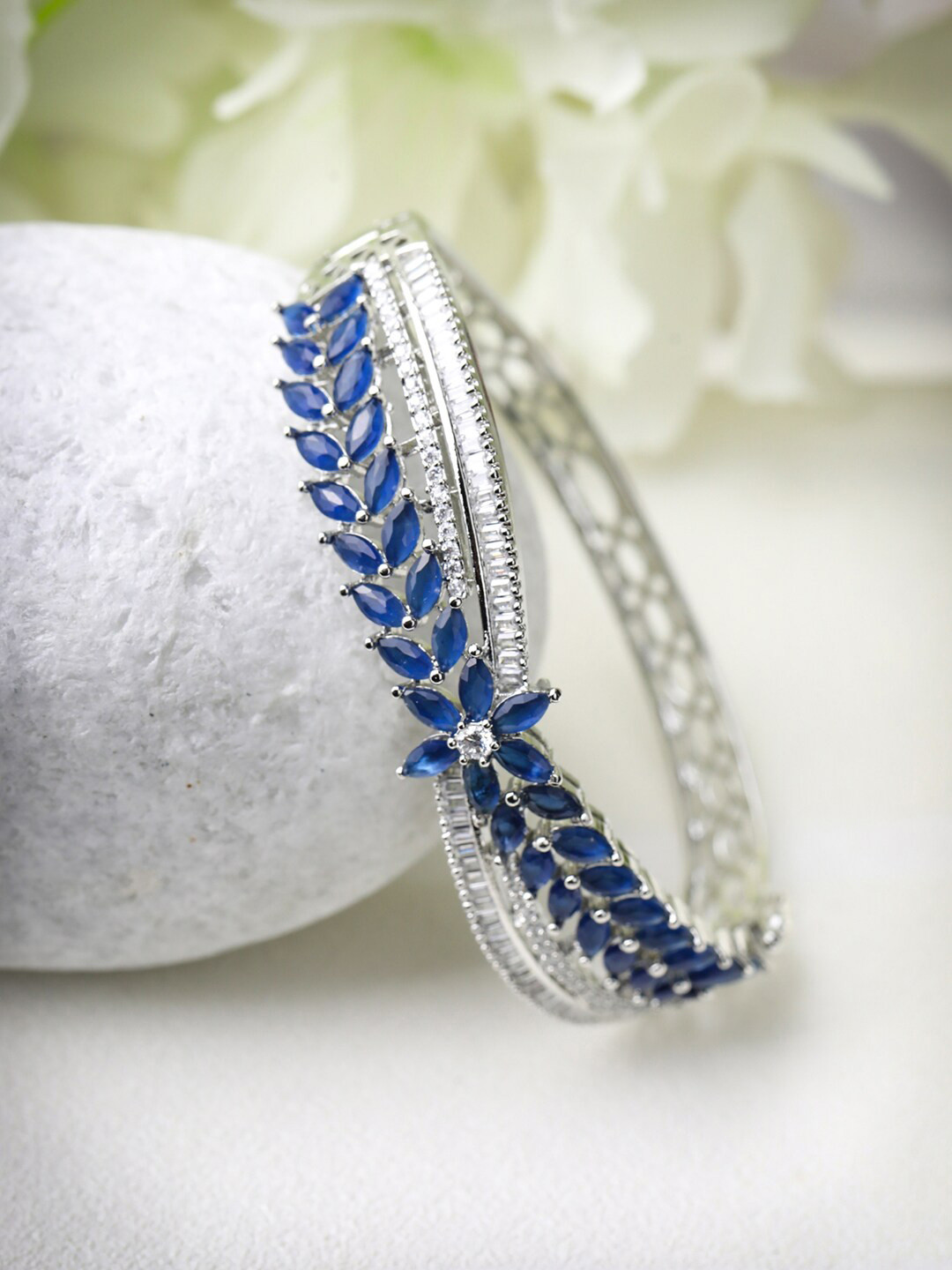 

Priyaasi Women Silver-Toned & Blue Brass American Diamond Bangle-Style Bracelet