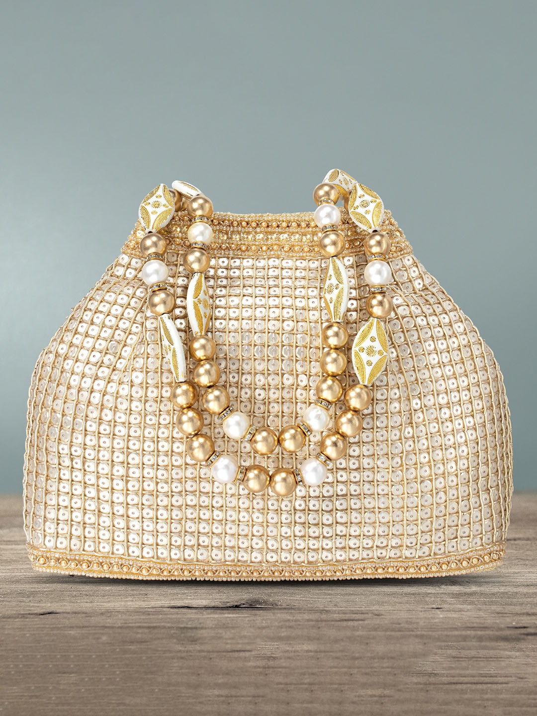 

Peora Women Gold-Toned & Cream-Coloured Embellished Potli Clutch