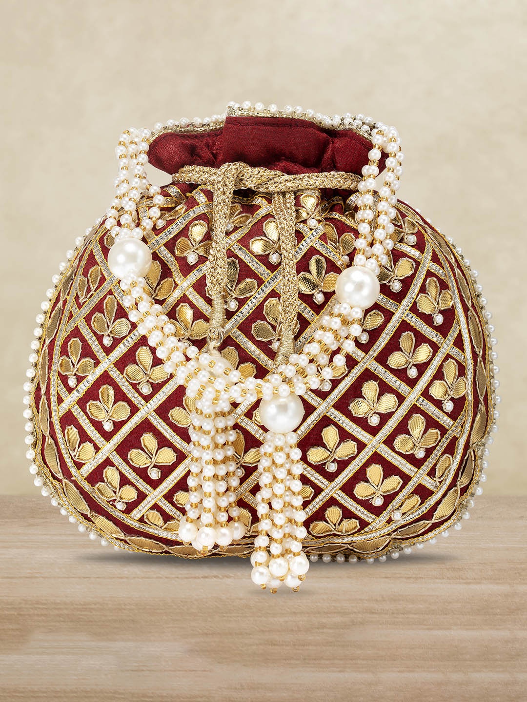 

Peora Gold-Toned & Maroon Embroidered Potli Clutch