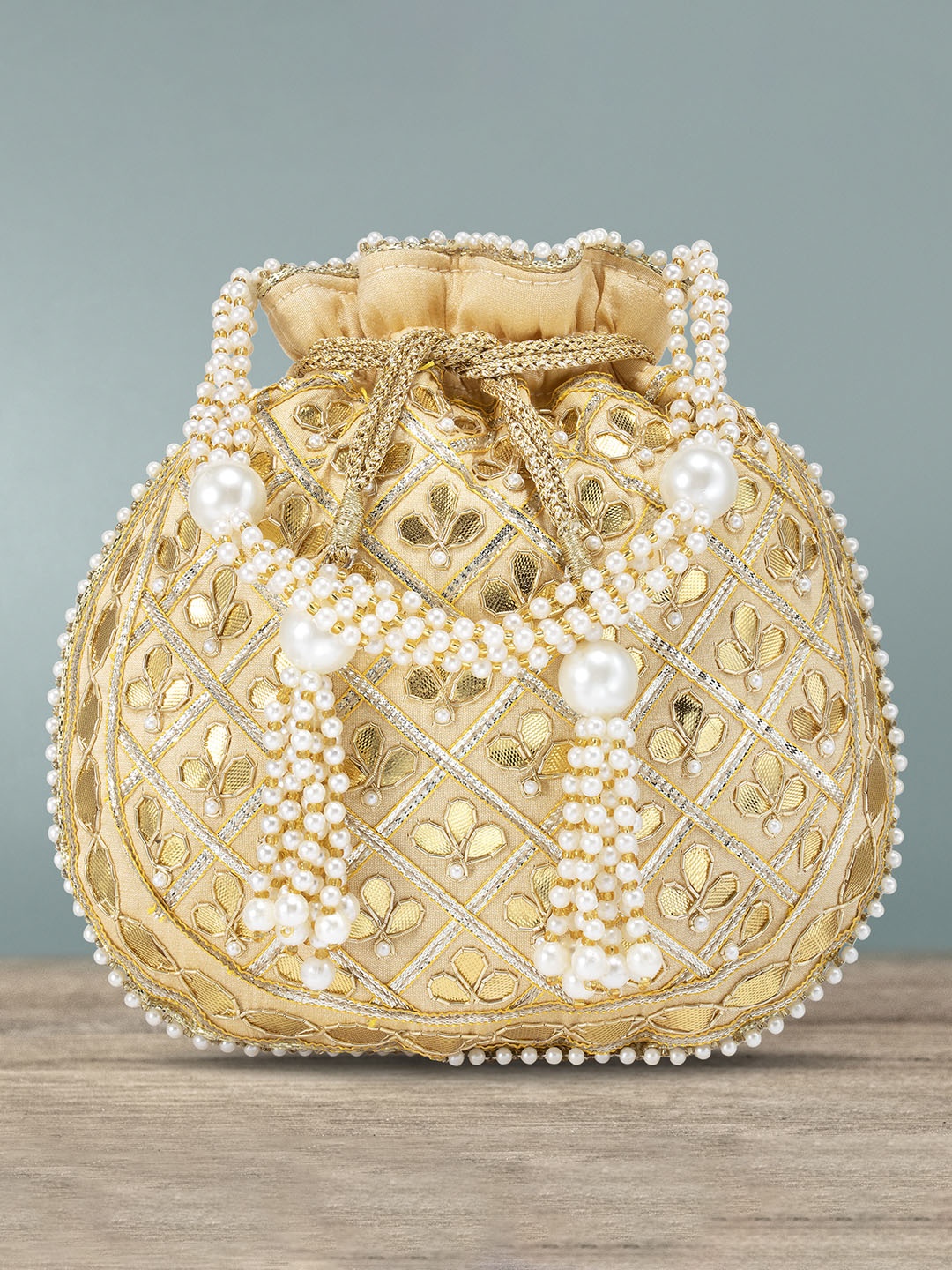 

Peora Cream-Coloured & Gold-Toned Embellished Potli Clutch