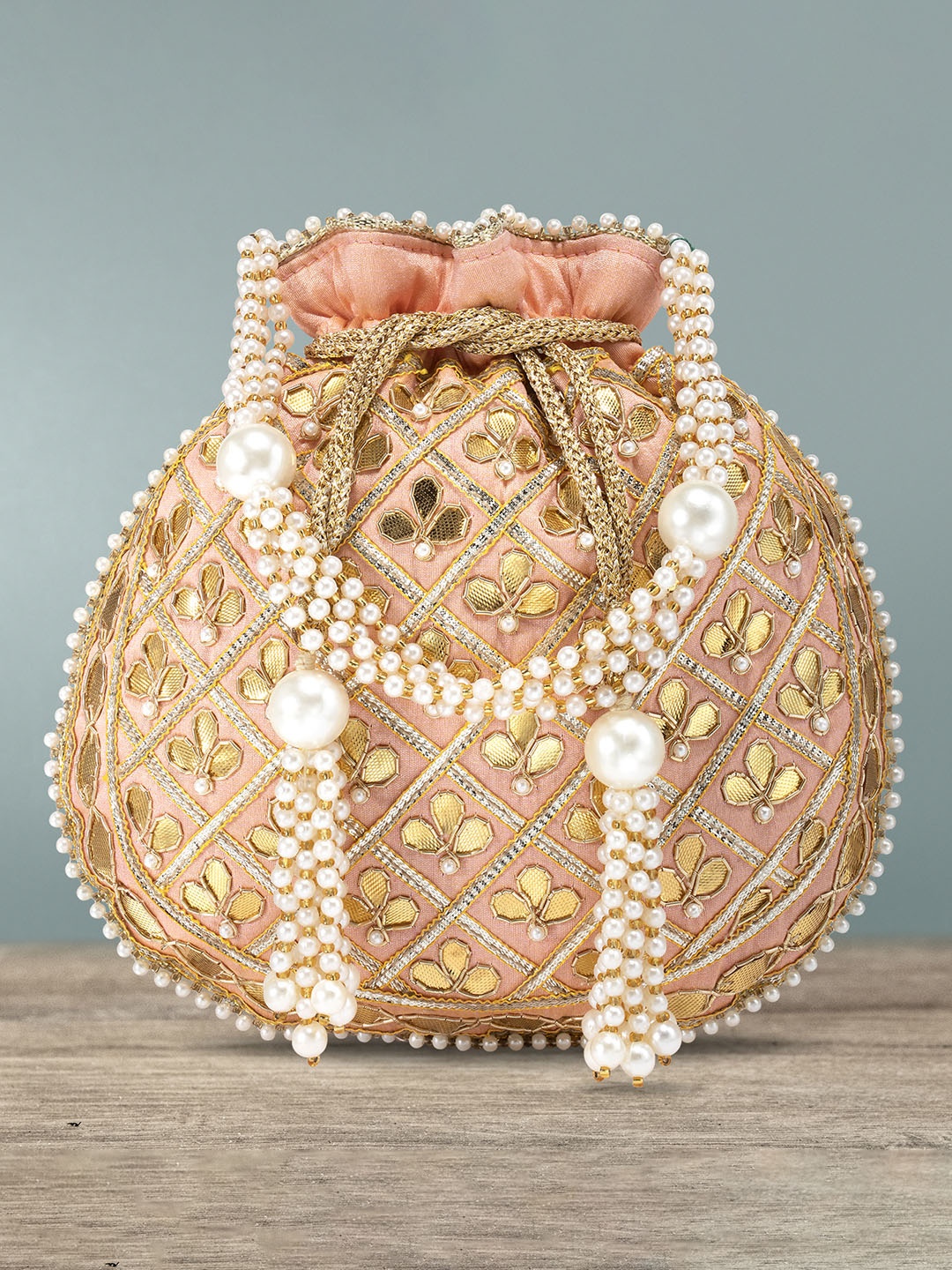 

Peora Peach-Coloured & Gold-Toned Embellished Potli Clutch