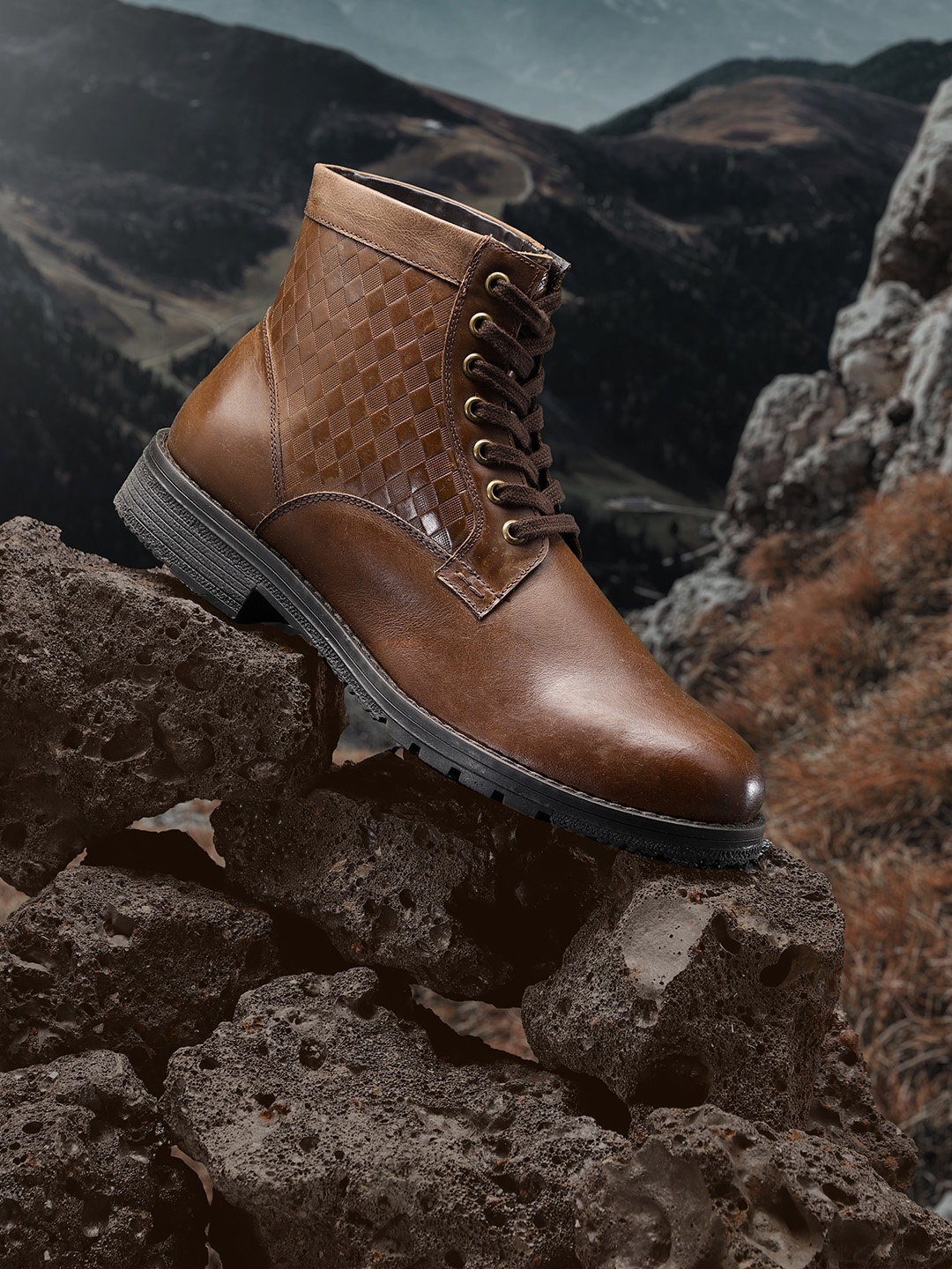 

The Roadster Lifestyle Co Men Brown Solid Mid-Top Leather Flat Boots with Textured Detail
