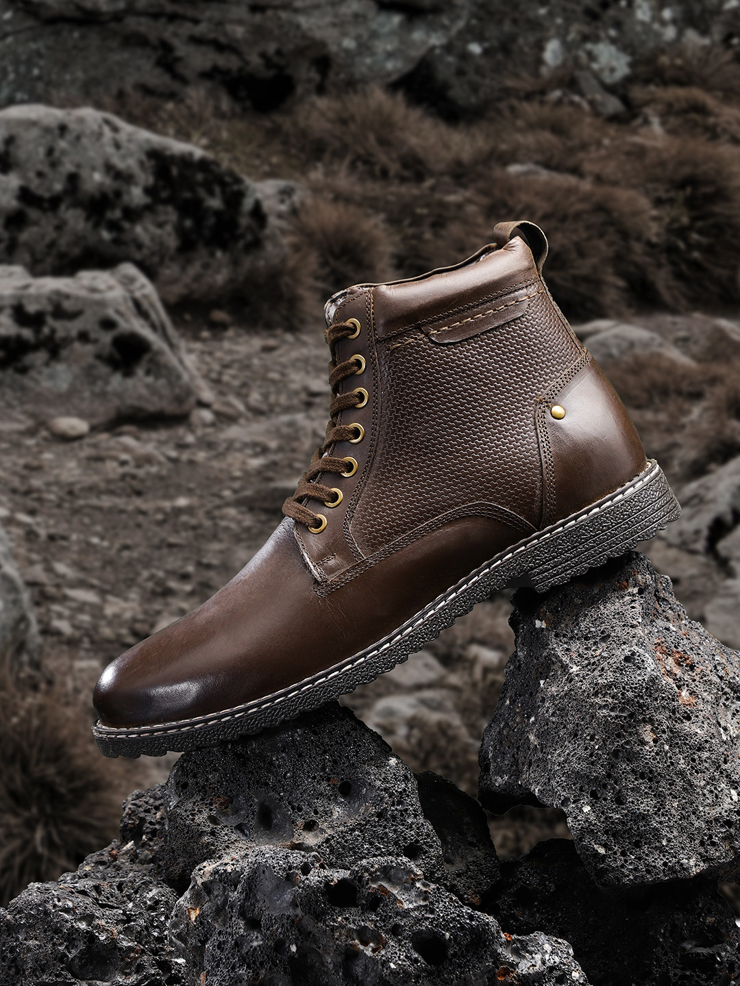 

The Roadster Lifestyle Co Men Coffee Brown Solid Mid-Top Leather Flat Boots with Textured Detail