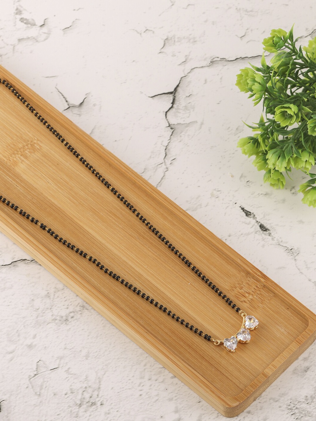 

Brandsoon Gold-Plated & Black Beaded American Diamond Studded Mangalsutra