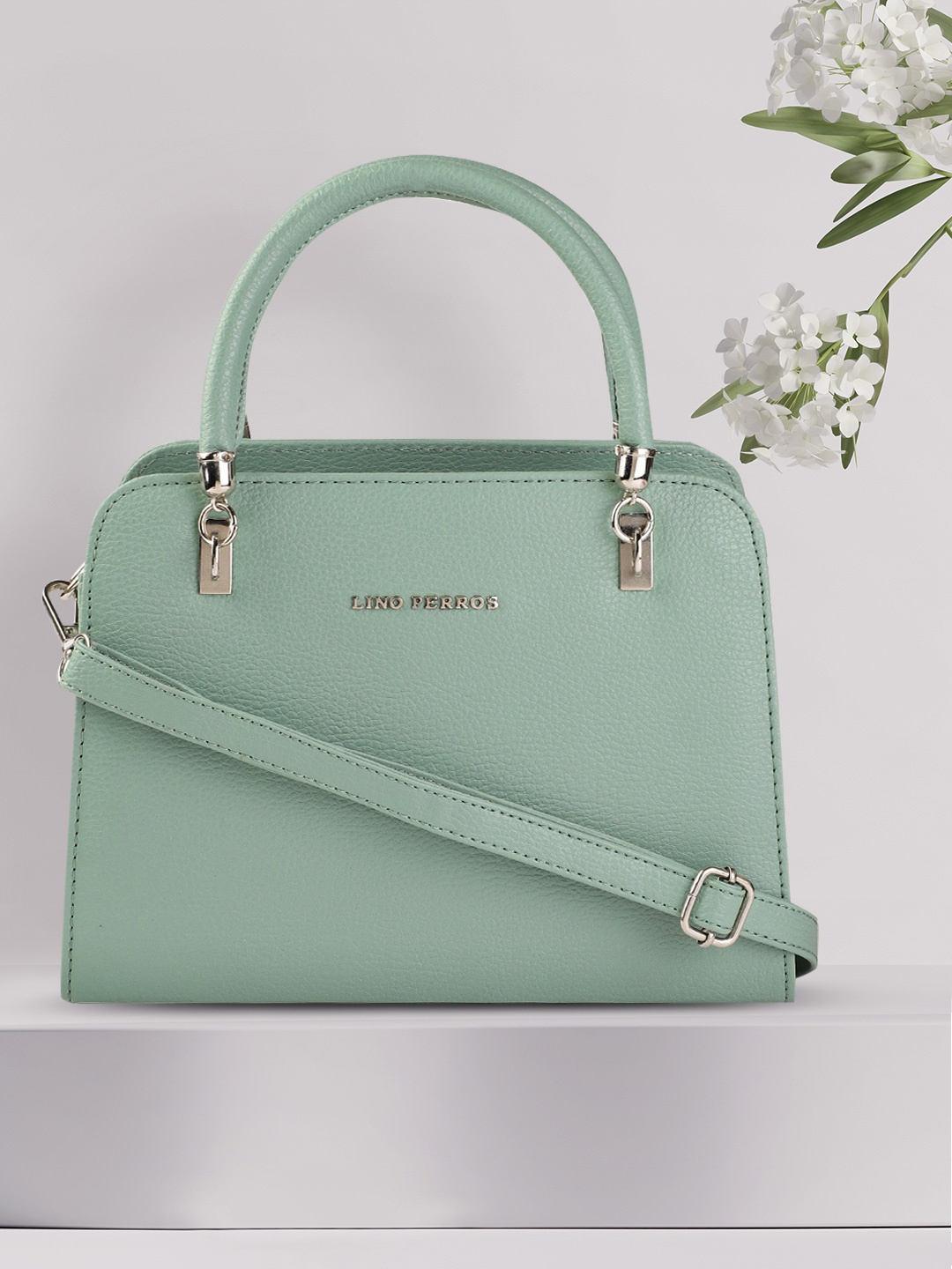 

Lino Perros Sea Green Solid Structured Handheld Bag