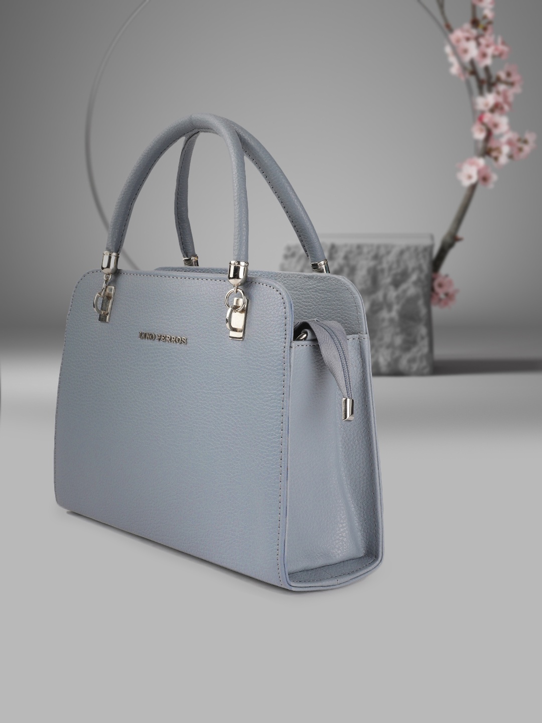 

Lino Perros Blue PU Solid Handheld Bag