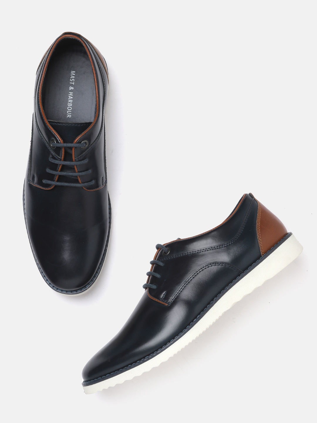 

Mast & Harbour Men Navy Blue Solid Derbys