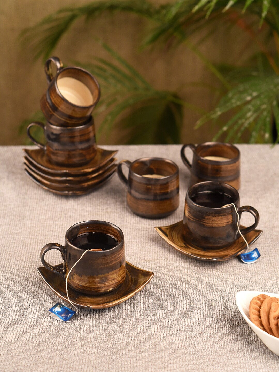 

Unravel India Set of 6 Coffee Brown Solid Ceramic Matte Cups and Saucers