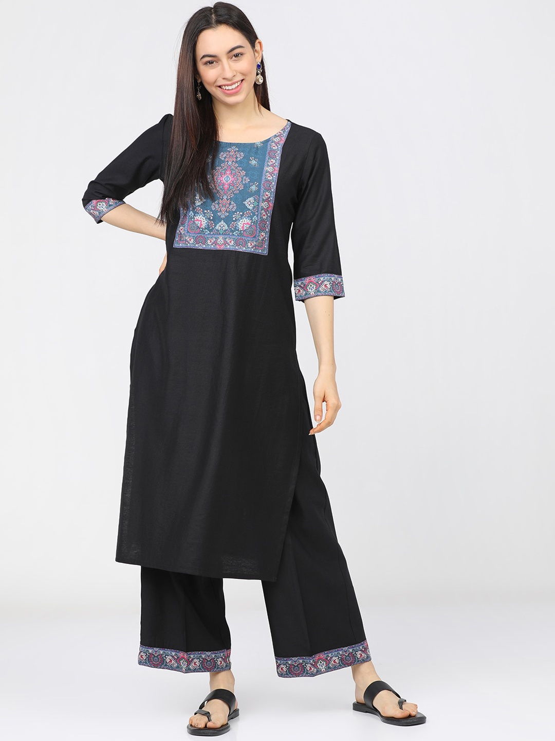 

Vishudh Women Black Ethnic Motifs Yoke Design Pleated Kurti with Palazzos