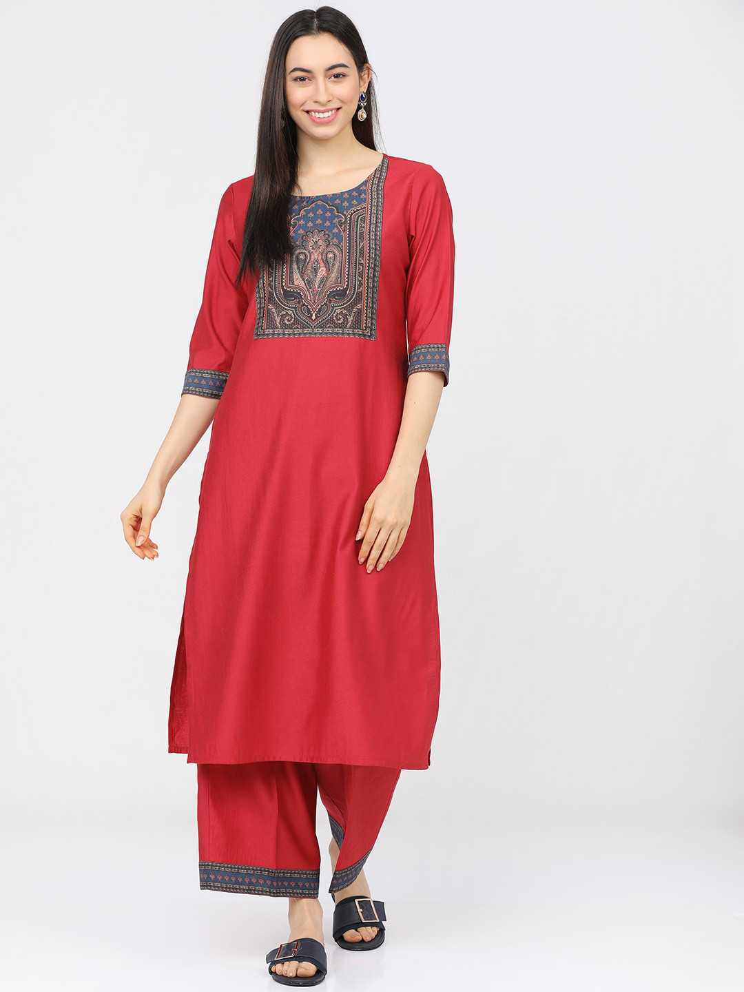 

Vishudh Women Red Ethnic Motifs Yoke Design Panelled Kurta with Palazzos