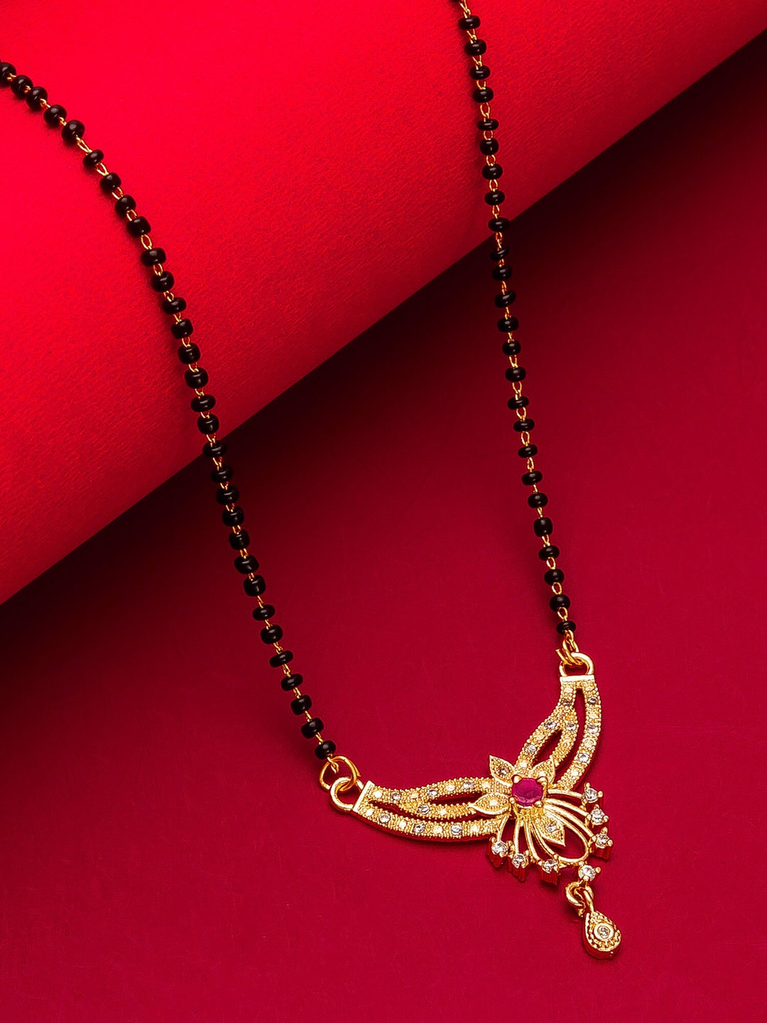 

aadita Woman Gold-Plated Black Beaded & White Stone-Studded Mangalsutra
