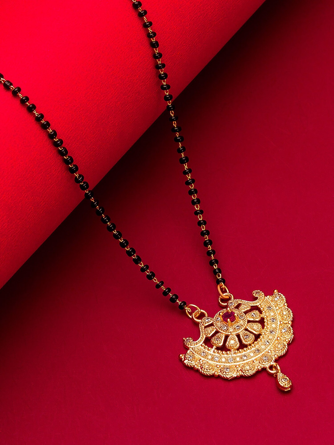 

aadita Woman Gold-Plated Black Beaded & White Stone-Studded Mangalsutra