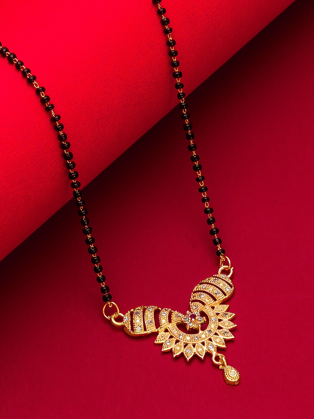 aadita Woman Gold-Plated Black Beaded & White Stone-Studded Mangalsutra