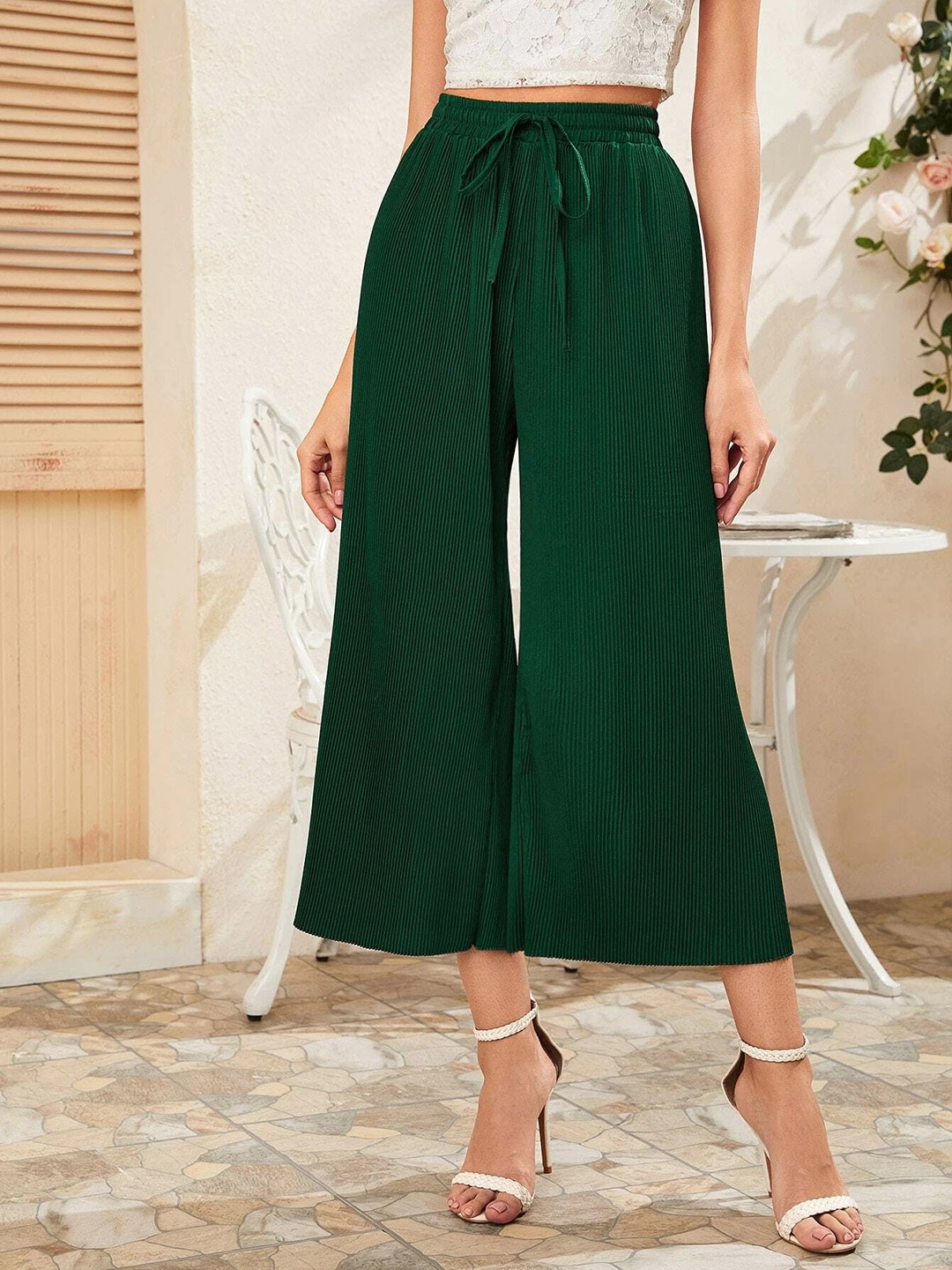 

URBANIC Women Green Solid Flared High-Rise Pleated Culottes Trousers