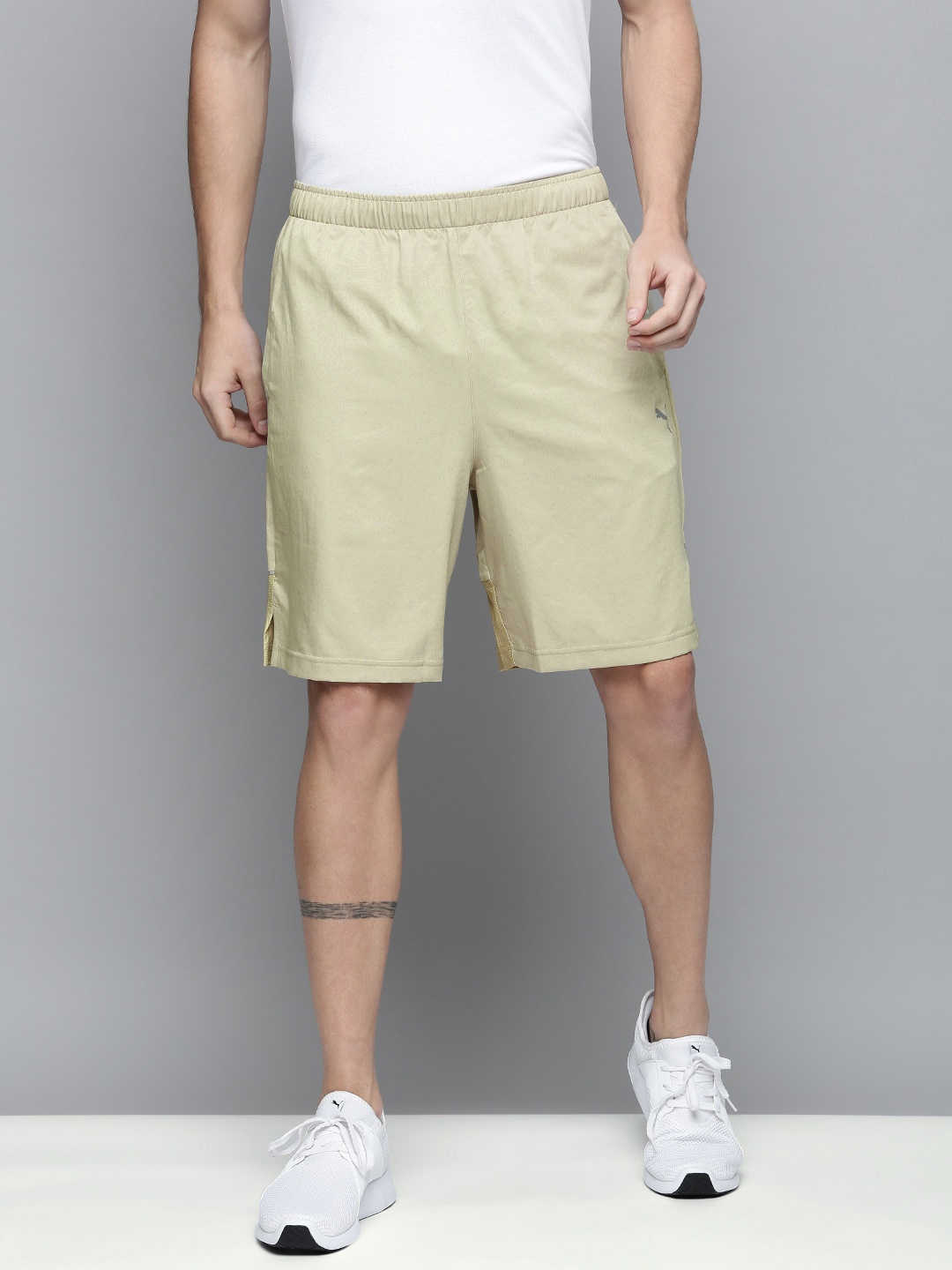

Puma Men Beige Solid Sports Shorts