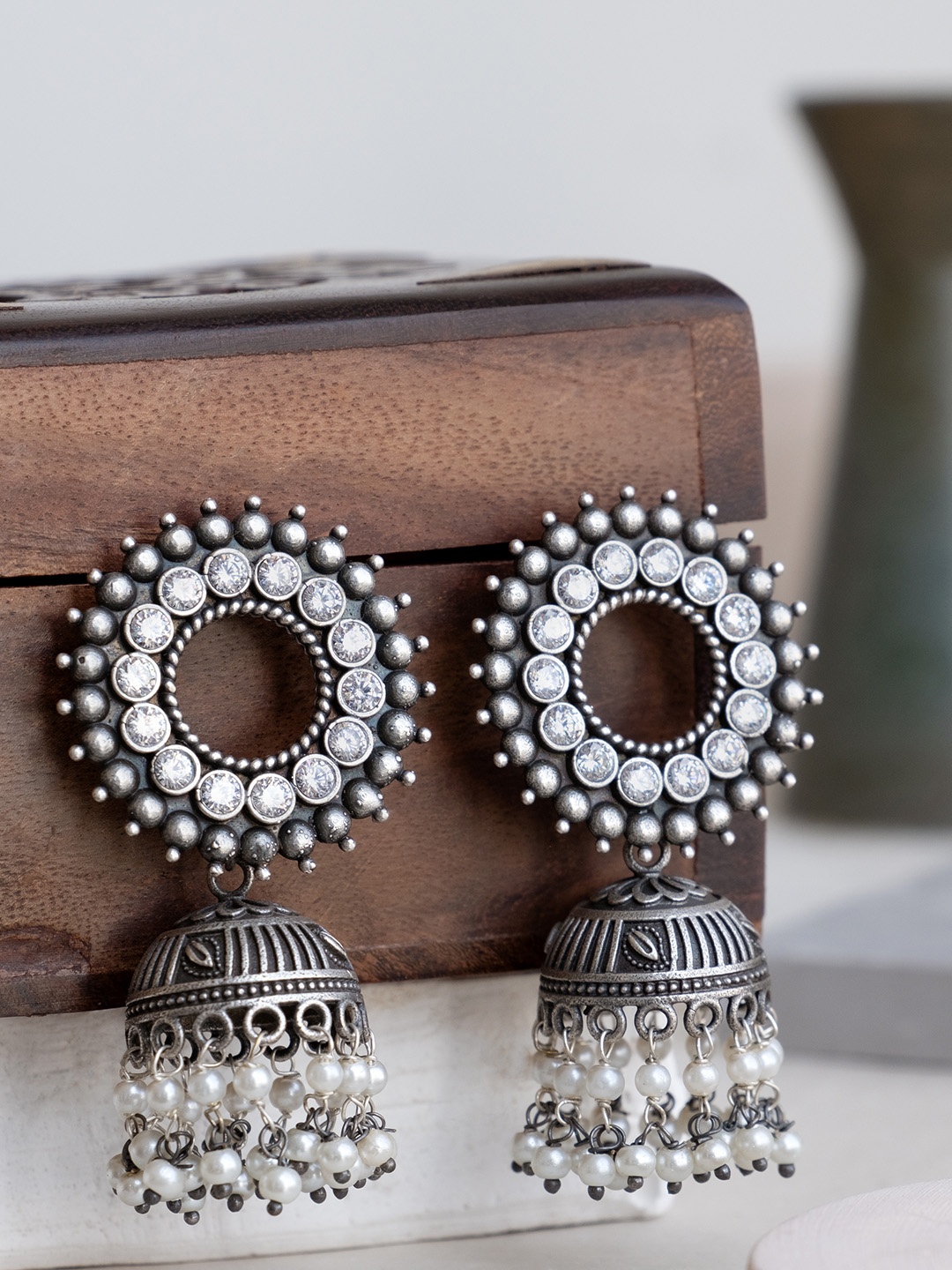 

Infuzze Silver-Toned Contemporary Jhumkas Earrings