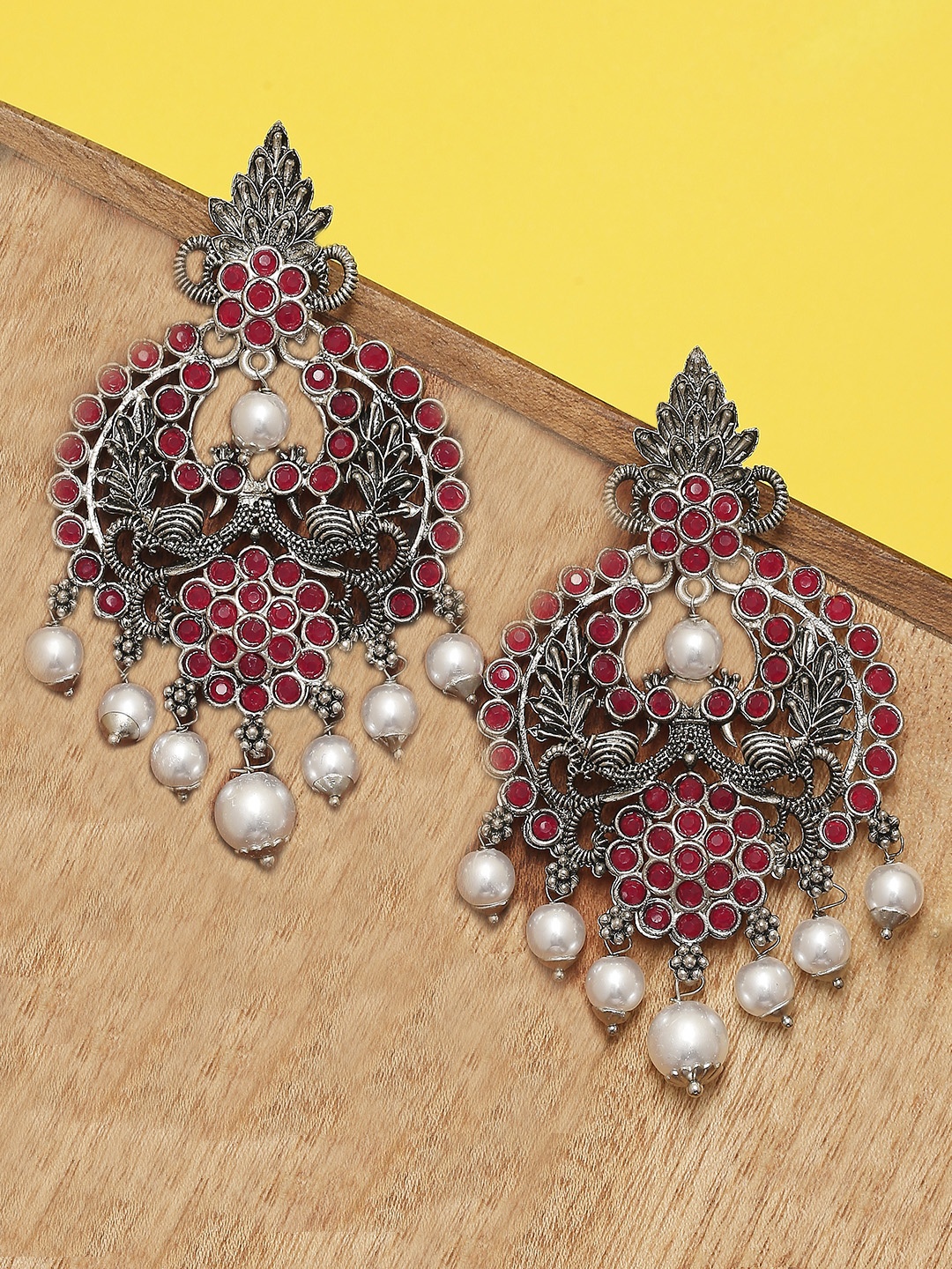 

OOMPH Silver-Toned Peacock Shaped Drop Earrings