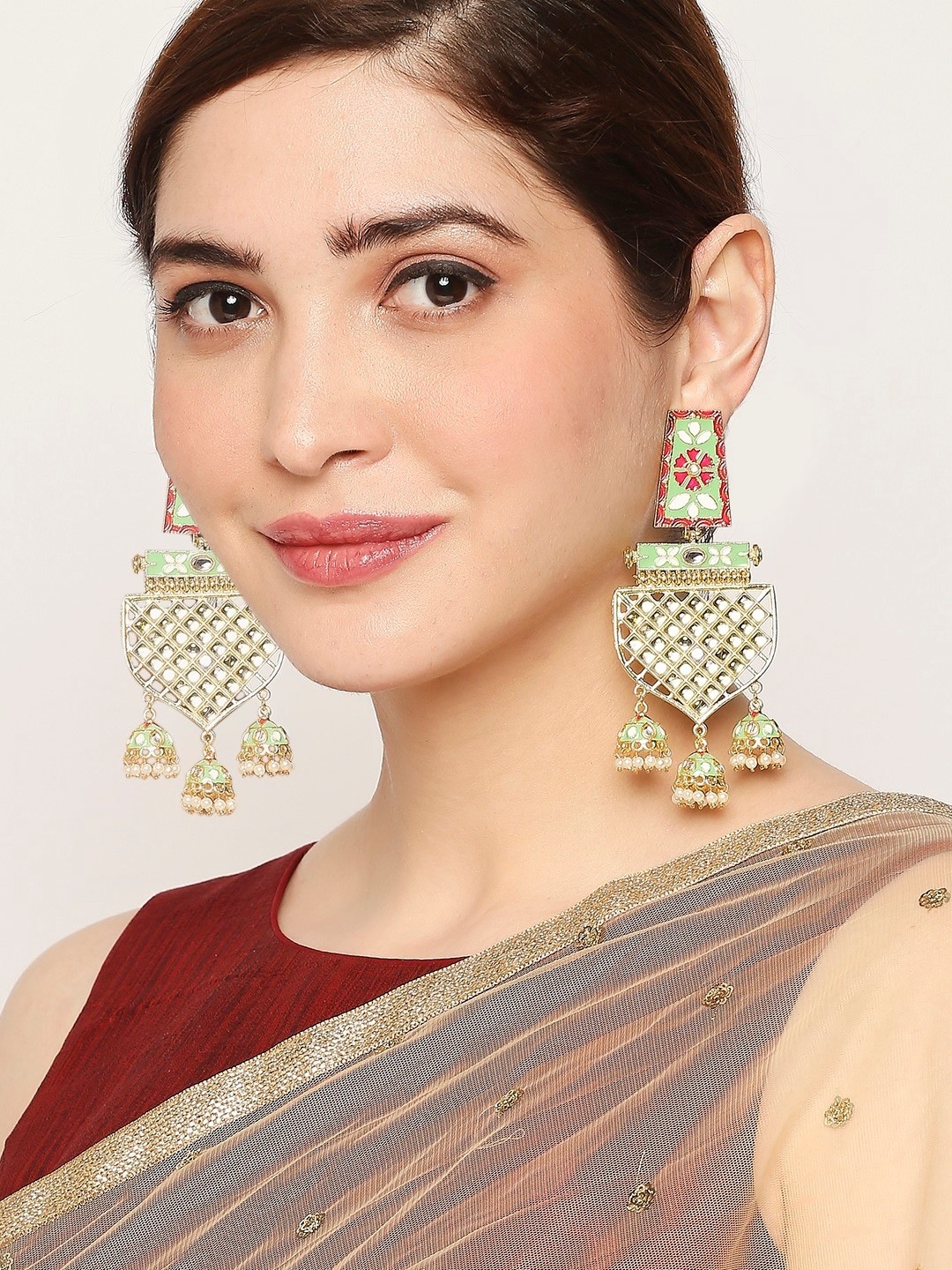 

OOMPH Green Geometric Jhumkas Earrings
