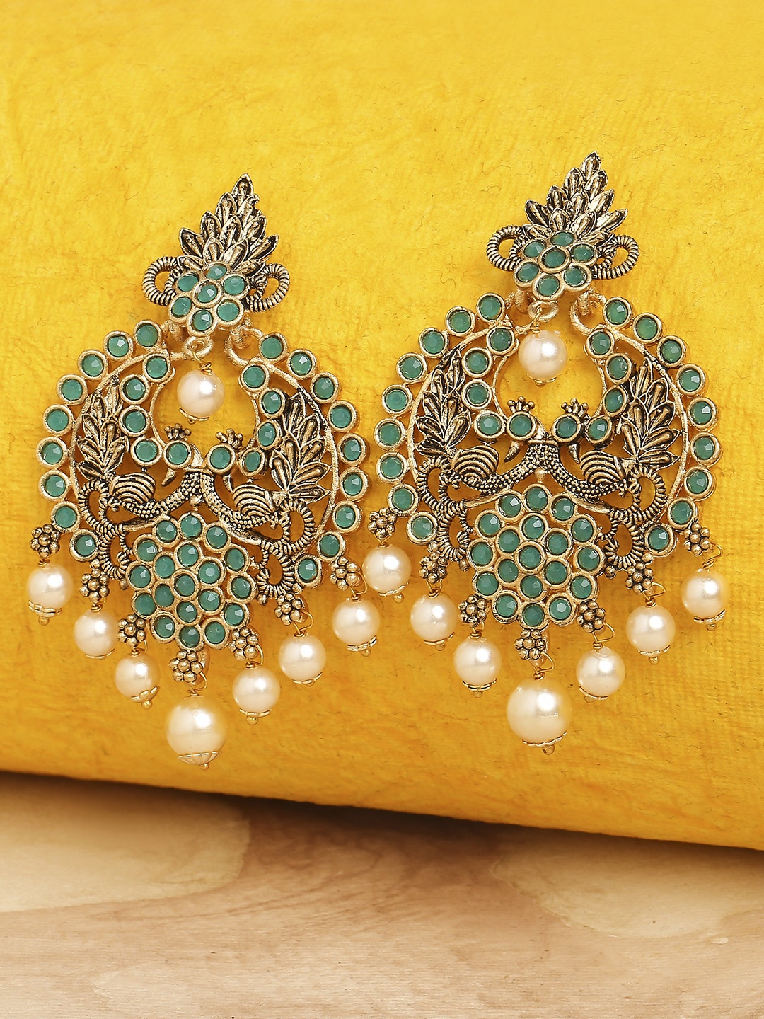 

OOMPH Green & Gold-Toned Peacock Shaped Chandbalis Earrings