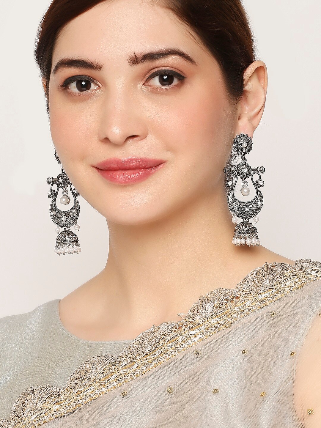 

OOMPH Silver-Toned Dome Shaped Jhumkas Earrings