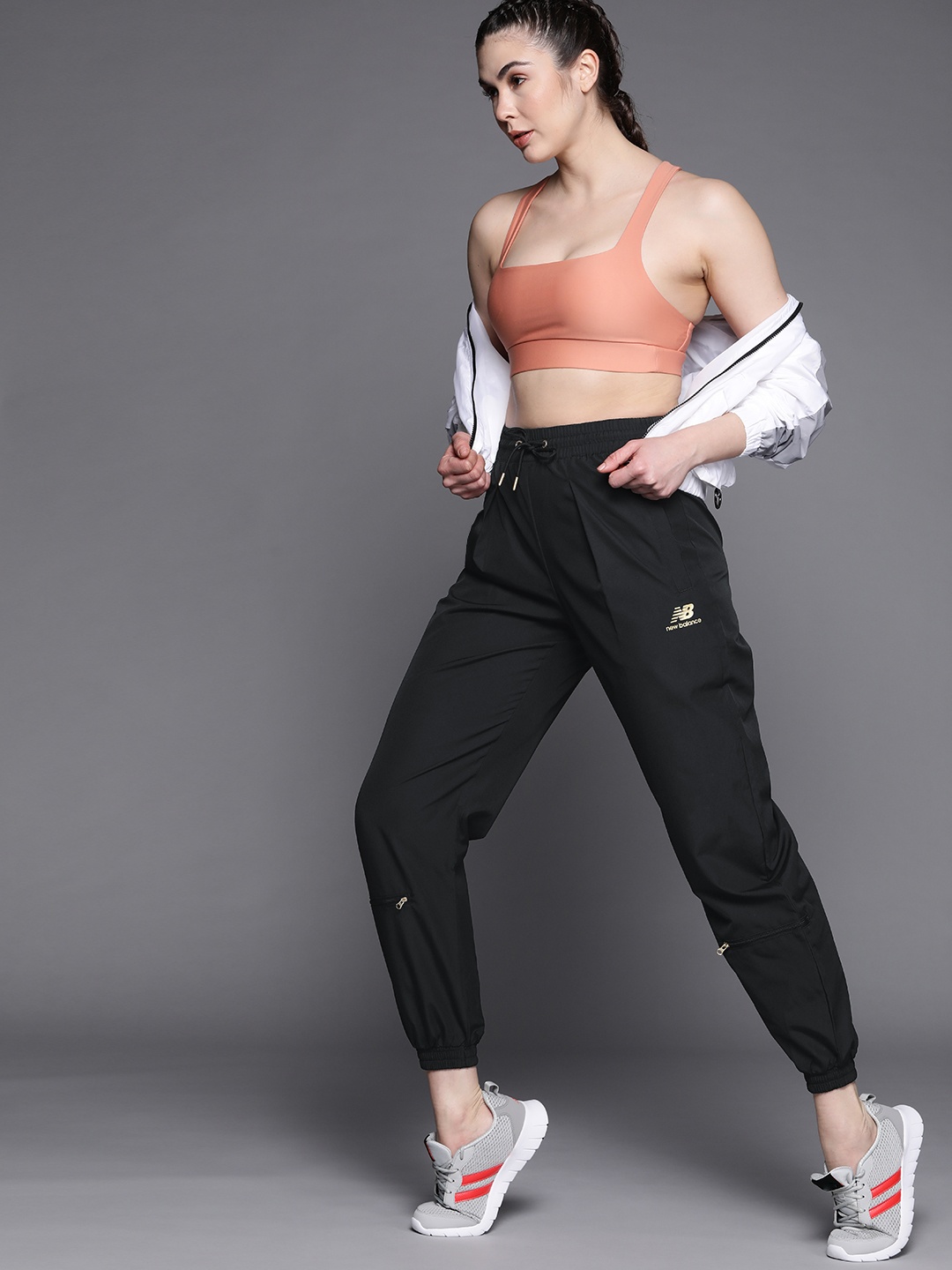 

New Balance Women Black Solid Track Pants