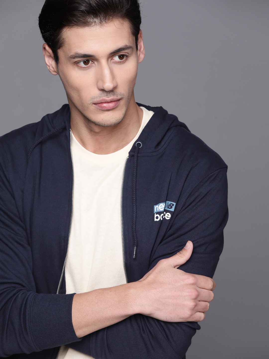 

New Balance Men Navy Blue Solid Hooded Sweatshirt