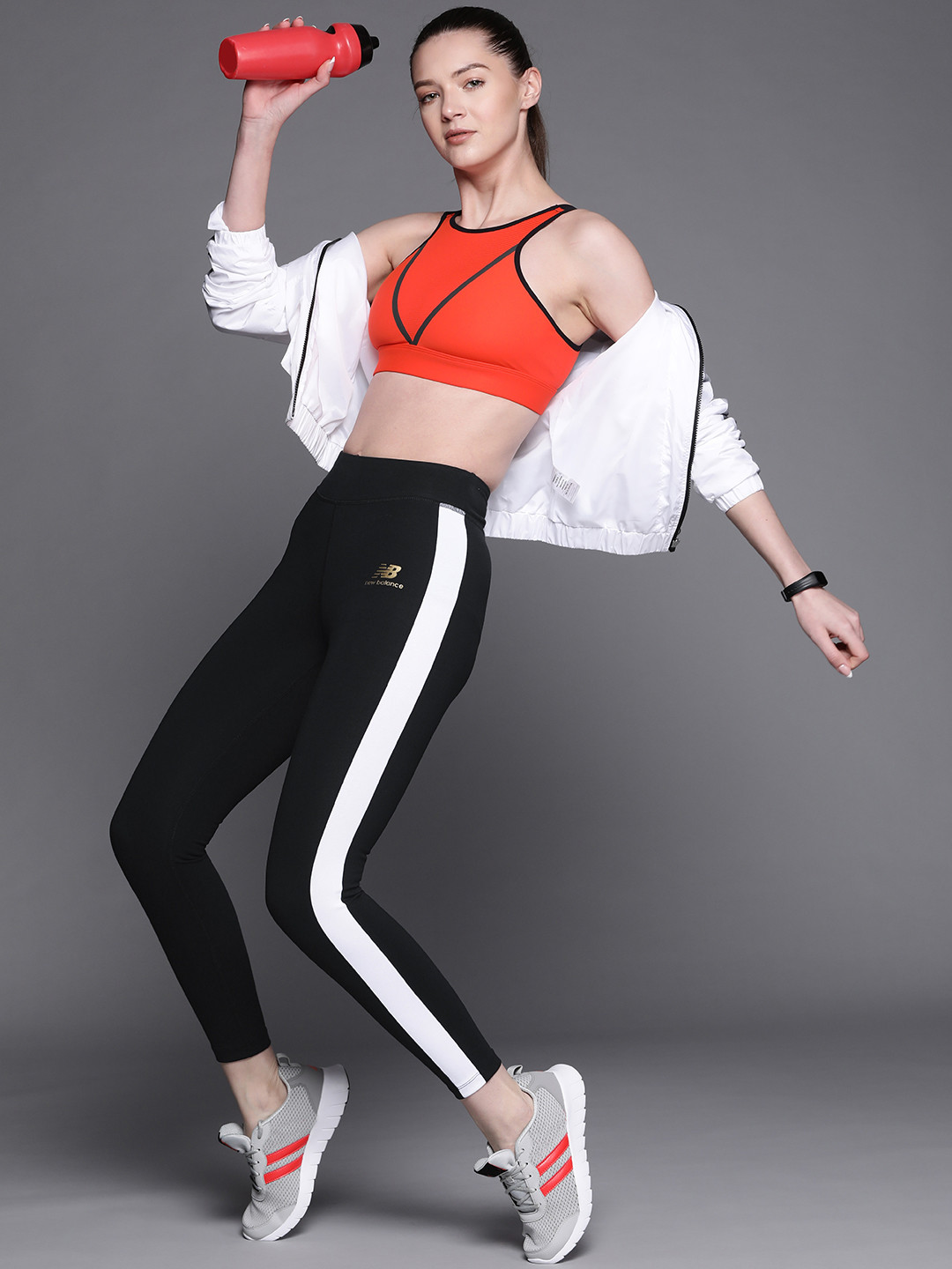 

New Balance Women Black Solid Sports Tights