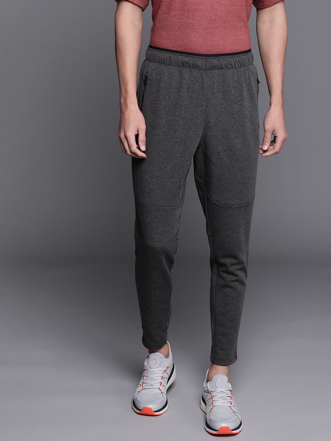 

New Balance Men Charcoal Grey Solid Track Pants