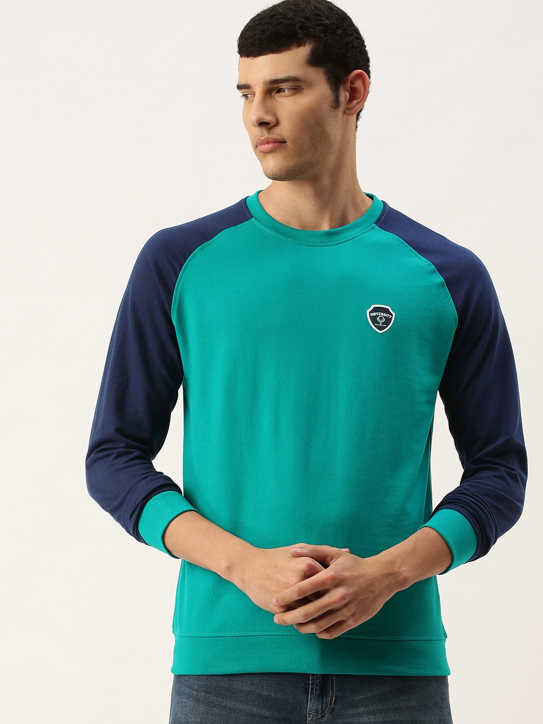 

Peter England Casuals Men Turquoise Blue Contrast Sleeves Sweatshirt