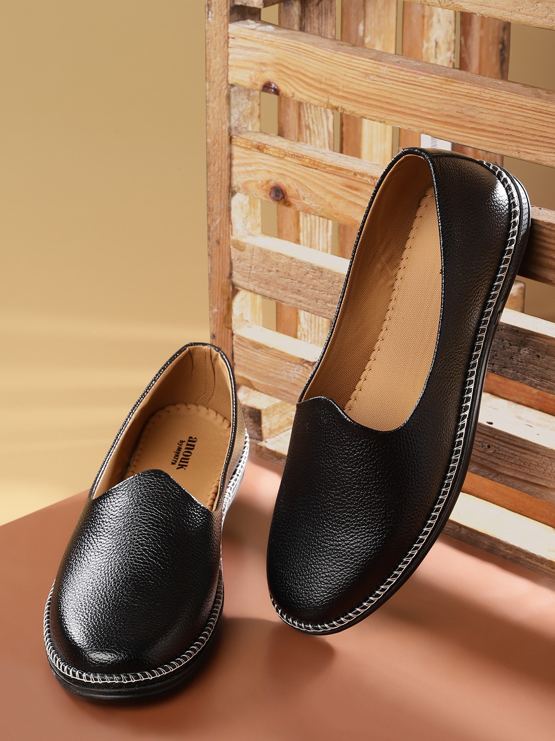 

Anouk Men Black Solid Slip-Ons