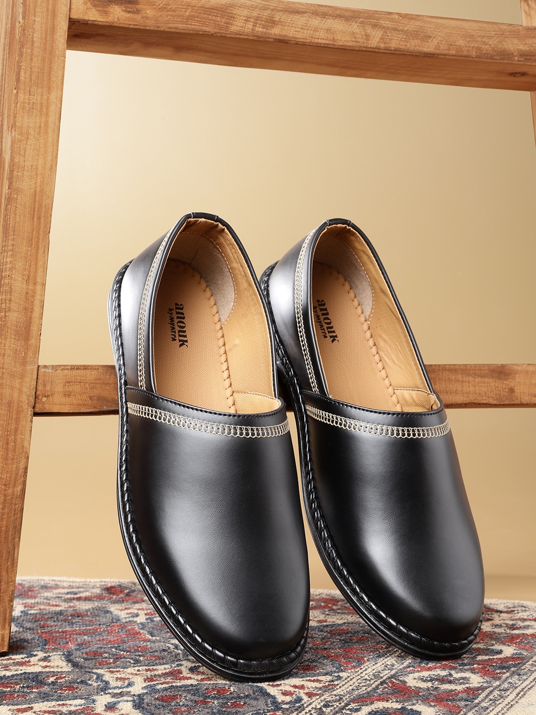 

Anouk Men Black Solid Slip-Ons