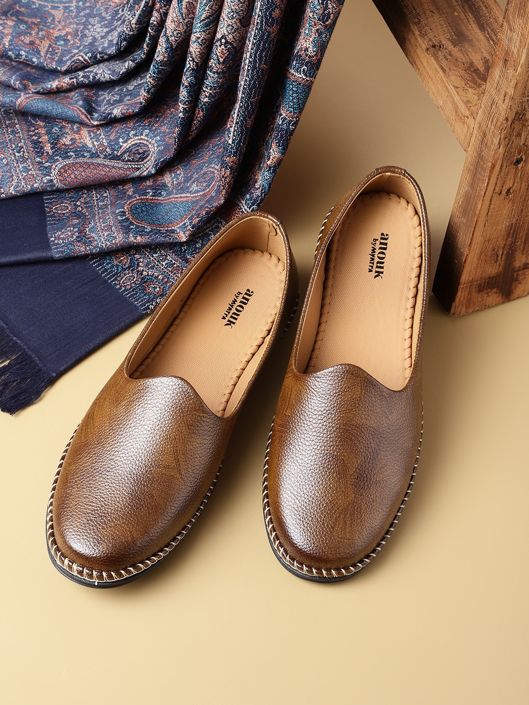 

Anouk Men Brown Solid Slip-Ons
