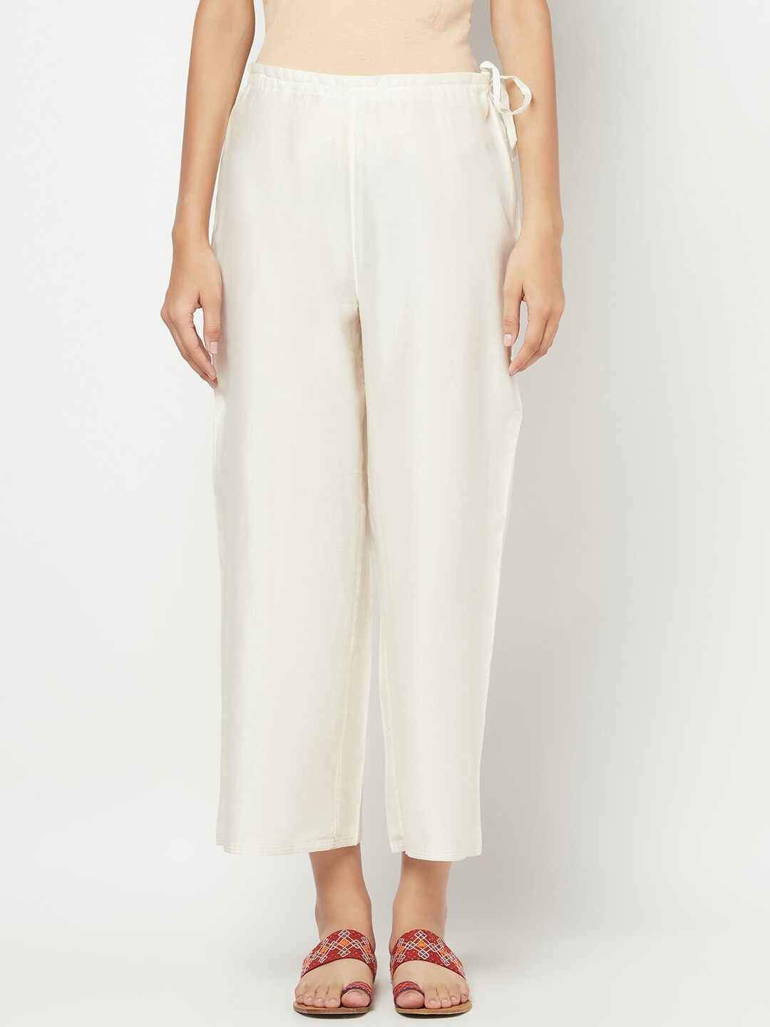

Fabindia Women Beige Palazzos