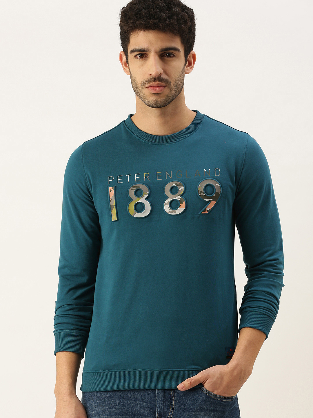 

Peter England Casuals Men Teal Blue Printed Embossed Detail Sweatshirt