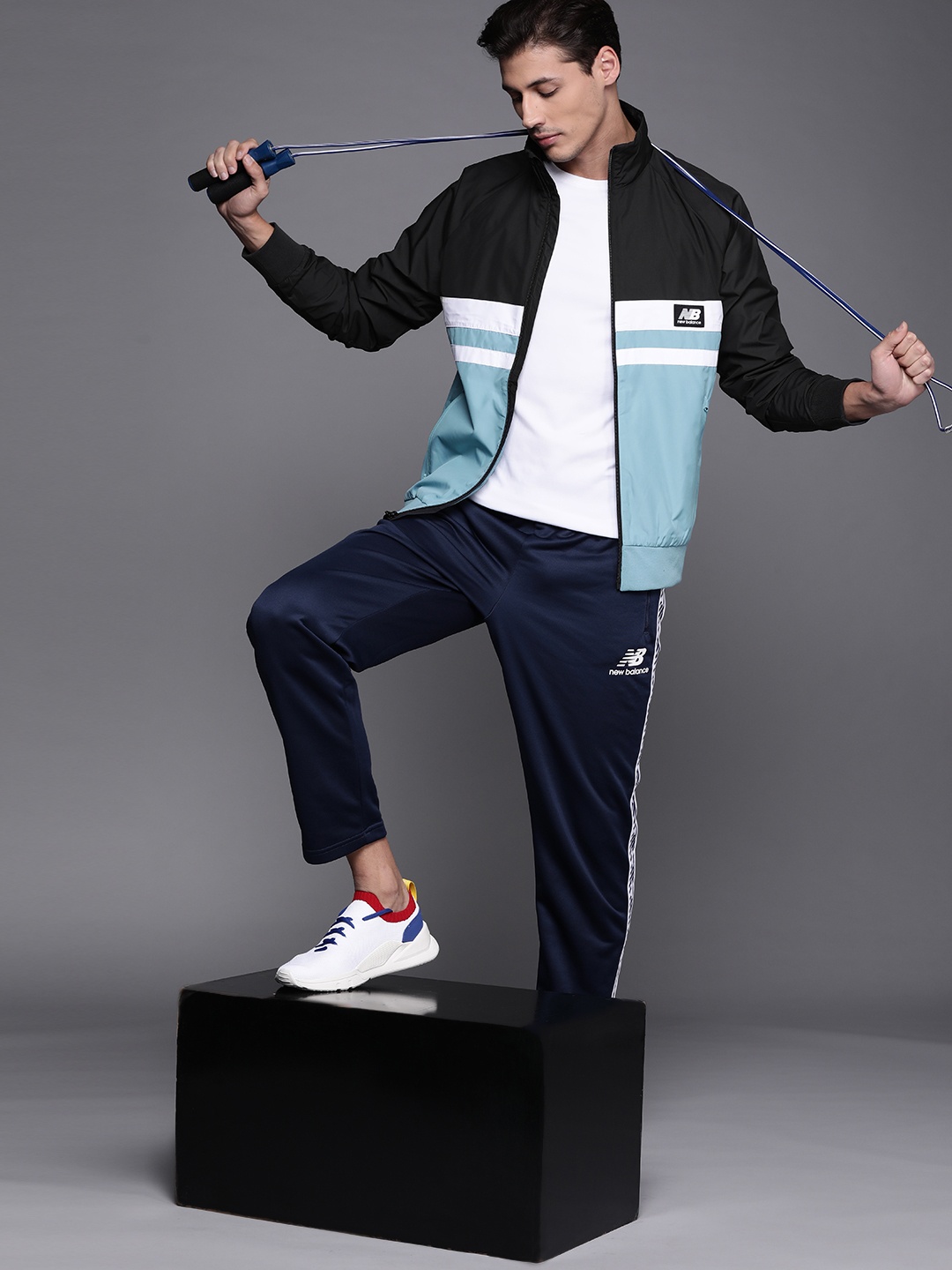 

New Balance Men Black & Blue Colourblocked Sporty Jacket