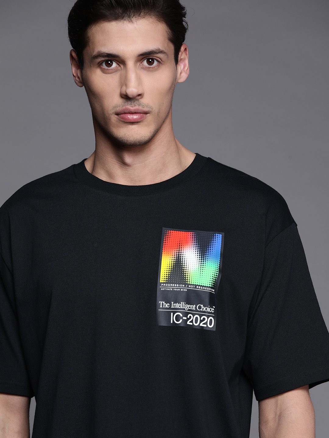 

New Balance Men Black Solid Pure Cotton T-shirt