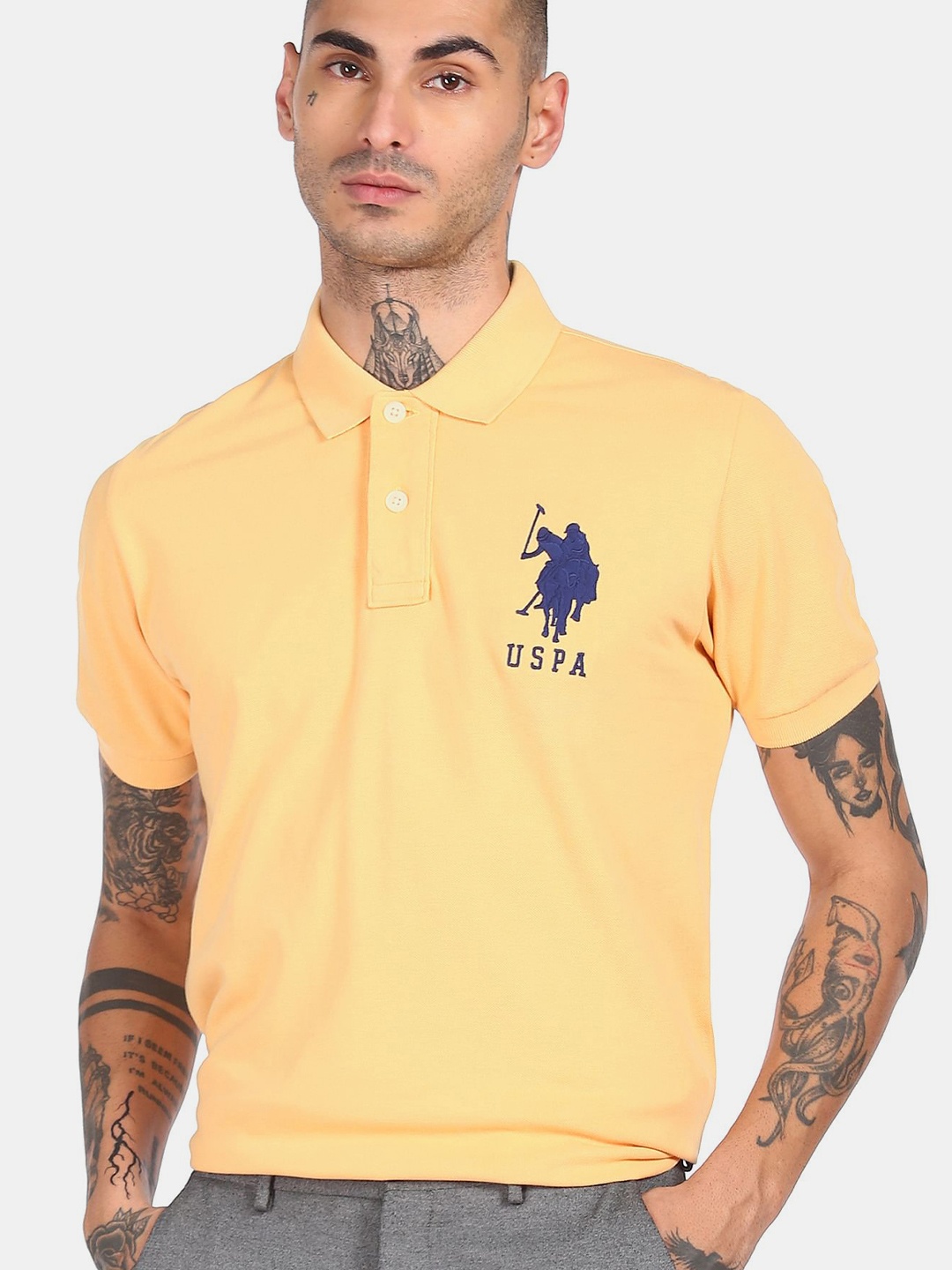 

U.S. Polo Assn. Men Yellow & Navy Blue Solid Polo Collar Cotton T-shirt