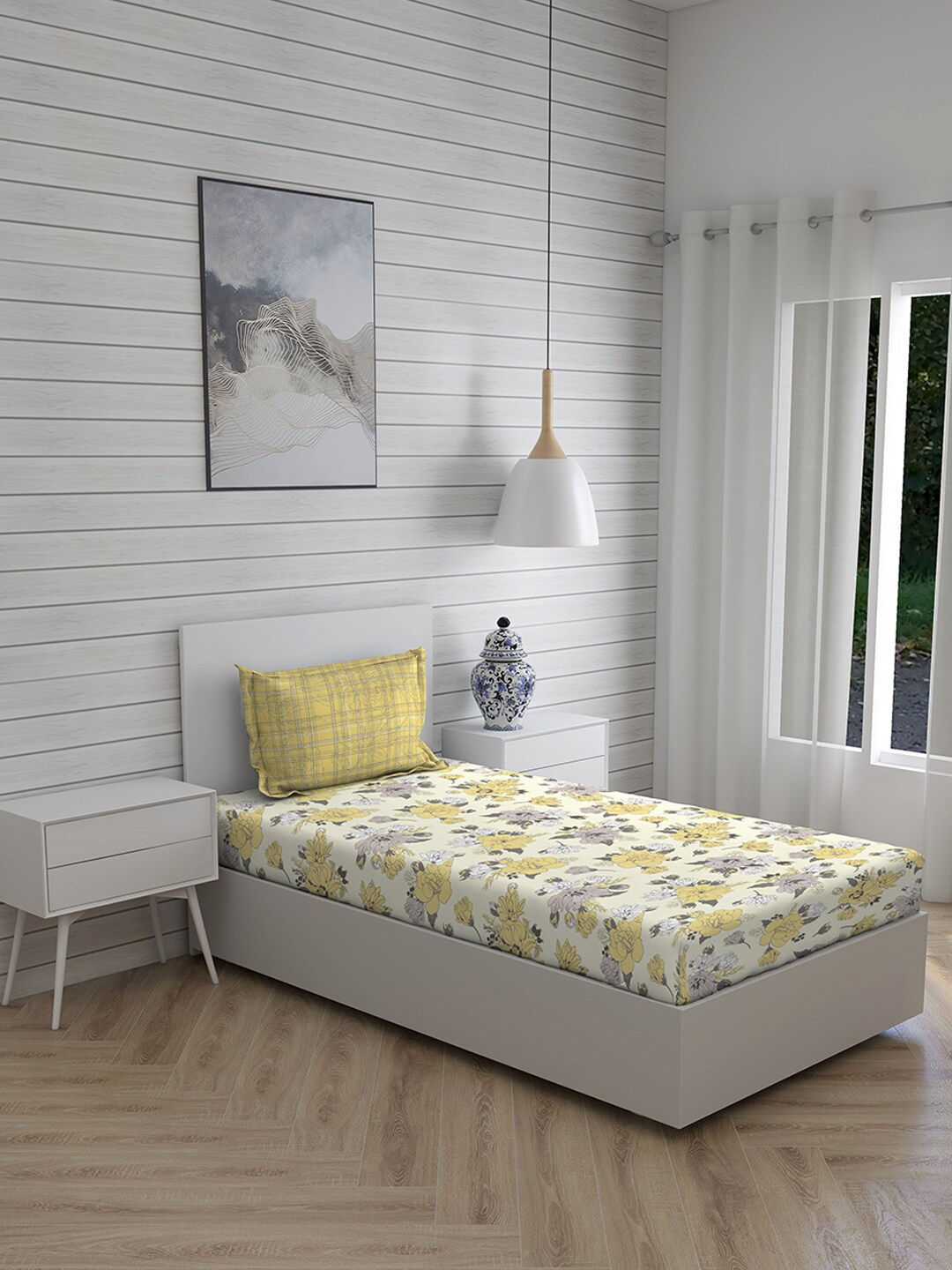 

Layers Yellow & White Floral 120 TC Single Bedsheet with 1 Pillow Covers