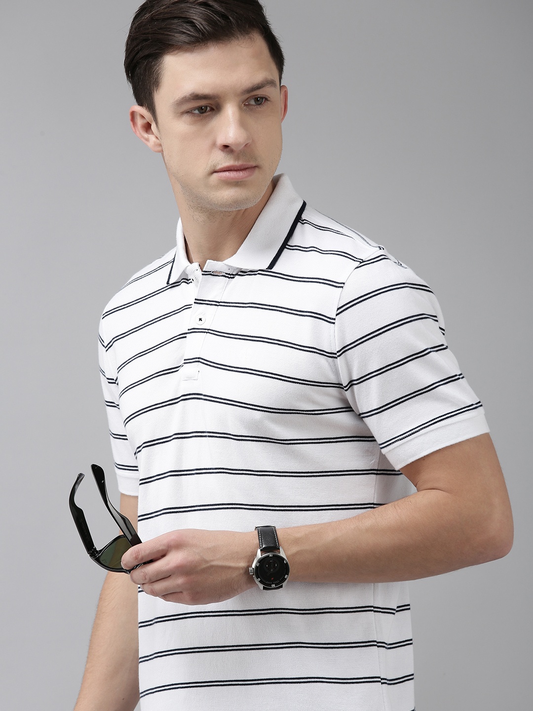 

Arrow Sport Men White & Black Striped Polo Collar Monochrome Pure Cotton T-shirt