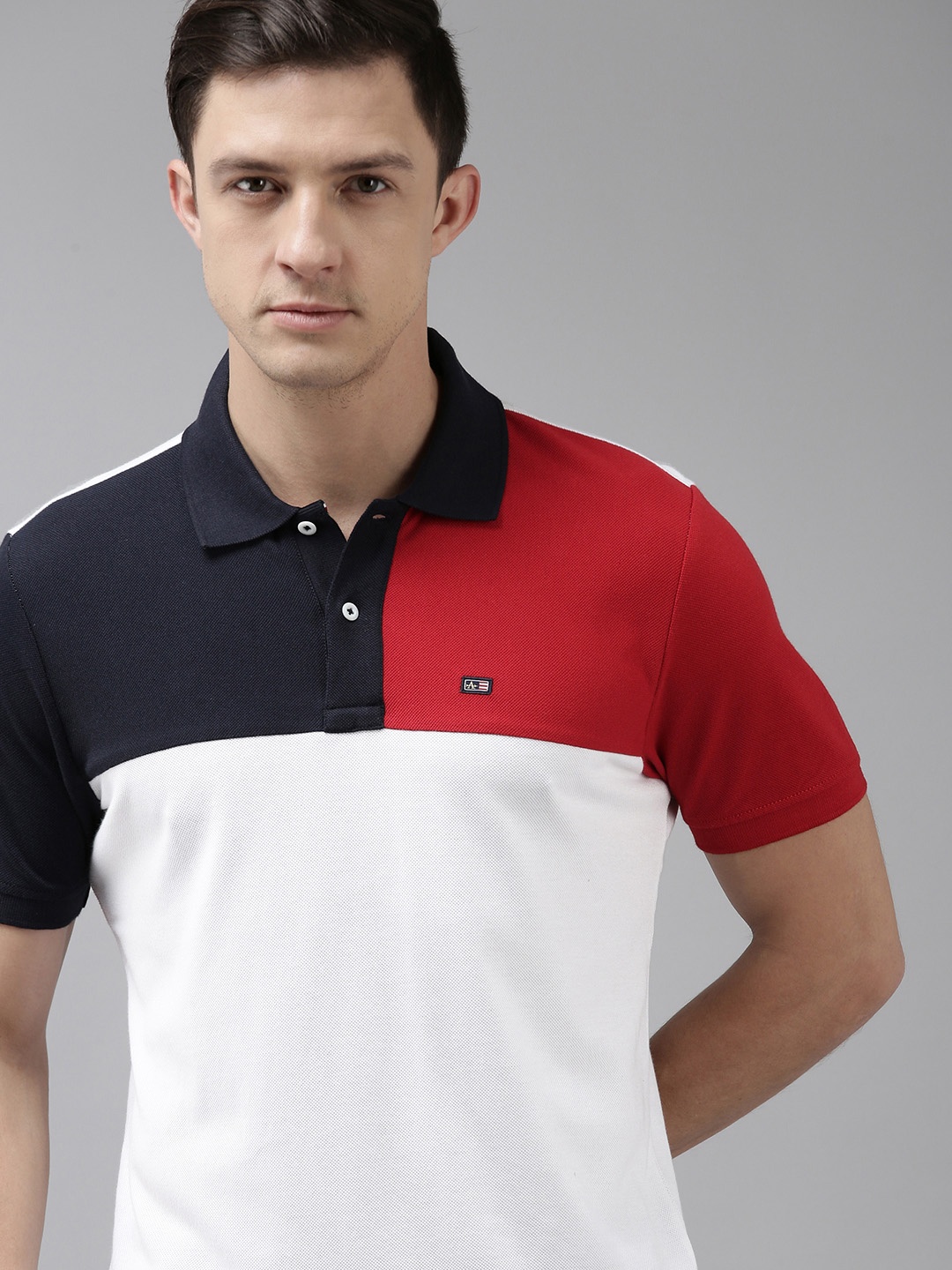 

Arrow Sport Men White & Navy Blue Coloublocked Polo Collar Pure Cotton T-shirt