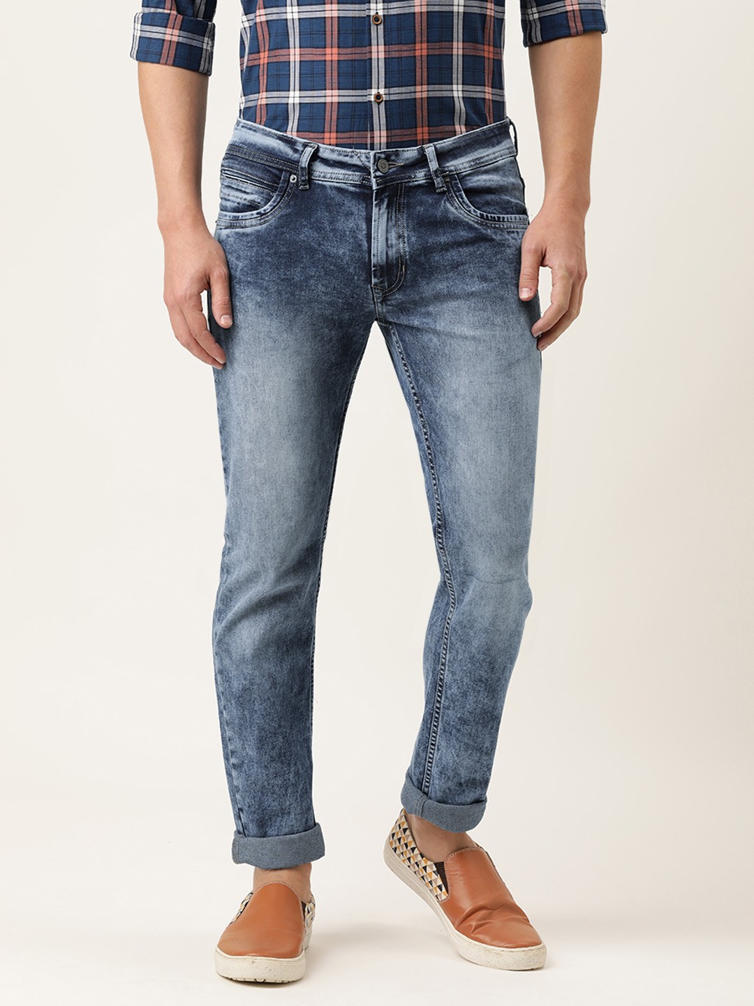 

Peter England Casuals Men Blue Slim Tapered Fit Mid Rise Heavy Fade Stretchable Jeans