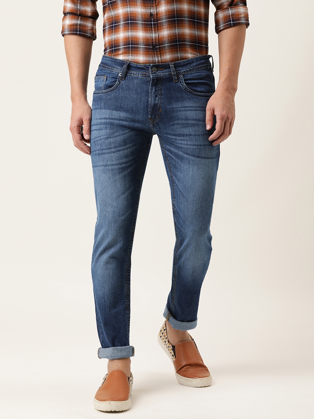 

Peter England Casuals Men Blue Slim Tapered Fit Light Fade Stretchable Jeans
