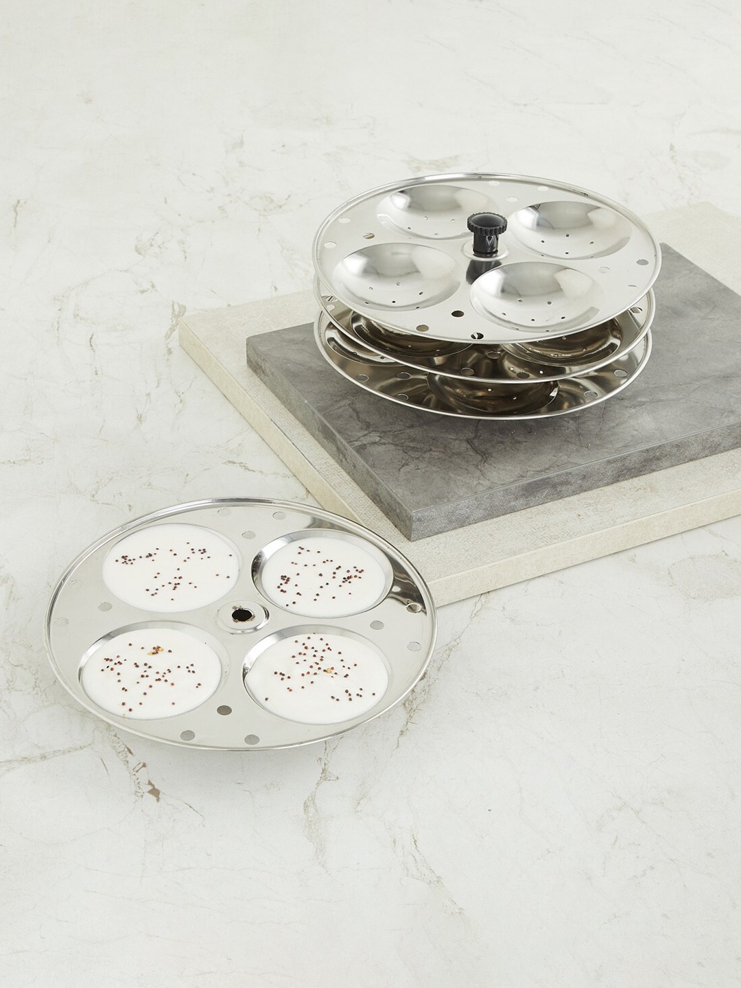 

Home Centre Silver Stainless Steel Idli Maker And Stand Set - 16Pcs