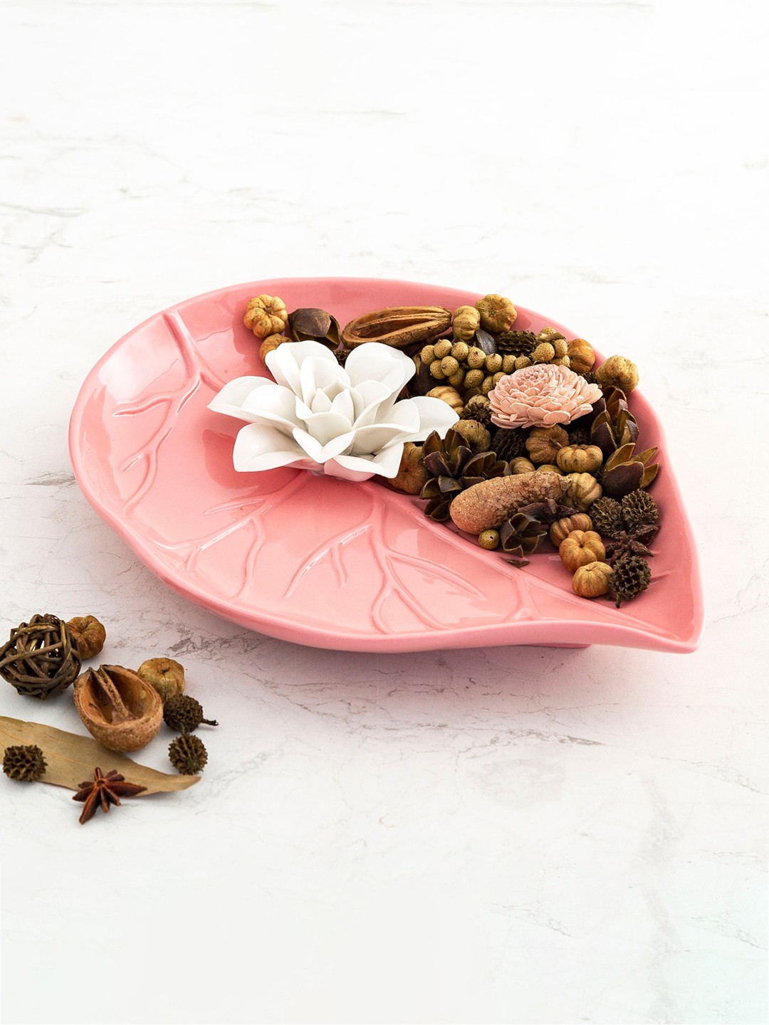 

Home Centre Pink Showpieces Textured Ceramic Decorative Platter