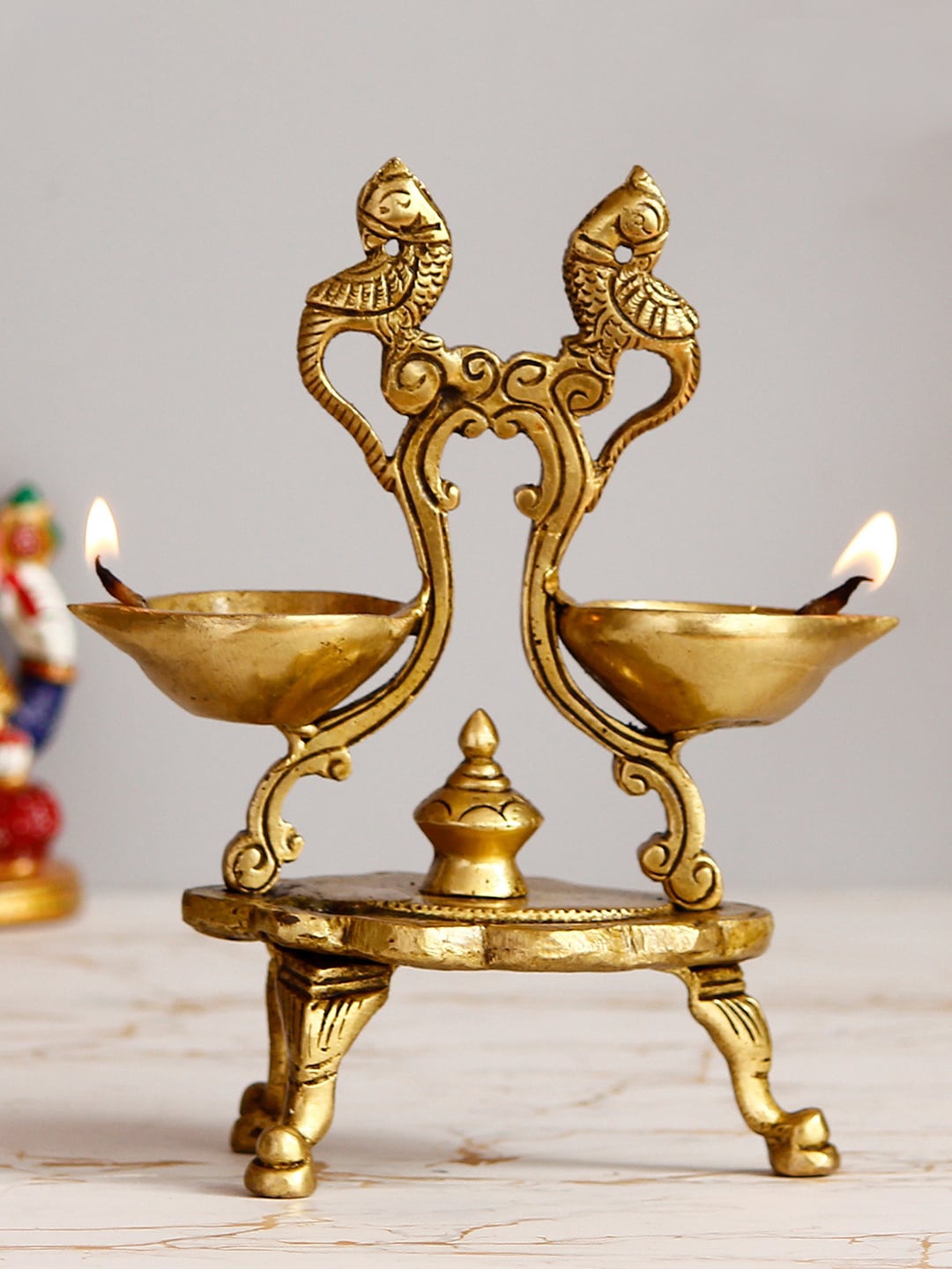 

eCraftIndia Gold Toned Parrot Design Brass Handcrafted Diya With Stand